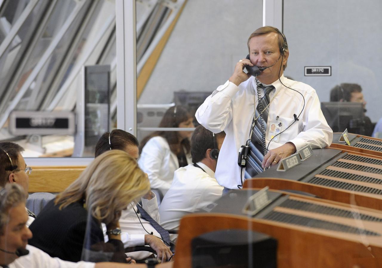 CAPE CANAVERAL, Fla. --  NASA Shuttle Launch Director Michael Leinbach talks on the phonein the Launch Control Center prior to the launch of space shuttle Discovery on the STS-124 mission on Saturday, May 31, 2008, at NASA's Kennedy Space Center.  The shuttle lifted off from Launch Pad 39A at 5:02 p.m. EDT.  Photo credit: NASA/Bill Ingalls