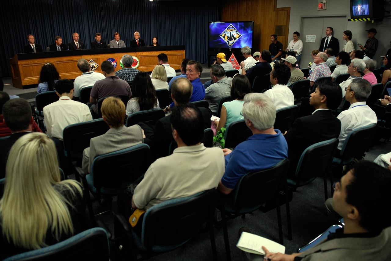 CAPE CANAVERAL, Fla. --   The media fill the NASA's News Center television studio for a news conference with key NASA personnel following the successful launch of space shuttle Discovery on the STS-124 mission.  On the stage are (left to right) Public Affairs Officer David Mould as moderator, NASA Administrator Michael Griffin, Associate Administrator for Space Operations Bill Gerstenmaier, Director of Mission Launch Integration LeRoy Cain, Shuttle Launch Director Mike Leinbach, Japan Aerospace Exploration Agency President Dr. Keiji Tachikawa and an interpreter.  The STS-124 mission is the 26th in the assembly of the space station.  It is the second of three flights launching components to complete the Japan Aerospace Exploration Agency's Kibo laboratory.  The shuttle crew will install Kibo's large Japanese Pressurized Module and its remote manipulator system, or RMS.  The 14-day flight includes three spacewalks.  Photo credit: NASAKim Shiflett