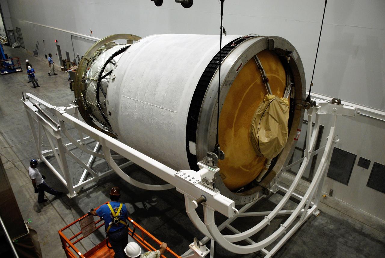 CAPE CANAVERAL, Fla. --   At Cape Canaveral Air Force Station, the second stage for the GOES-O Delta IV rocket rests in the rotation stand.  The second stage will be rotated to vertical and moved into a work cell for processing.  GOES – O is one of a series of Geostationary Operational Environmental Satellites. The multimission GOES series N-P will be a vital contributor to weather, solar, and space operations and science. NASA and the National Oceanic and Atmospheric Administration, or NOAA, are actively engaged in a cooperative program to expand the existing GOES system with the launch of the GOES N-P satellites.  Photo credit: NASA/Kim Shiflett