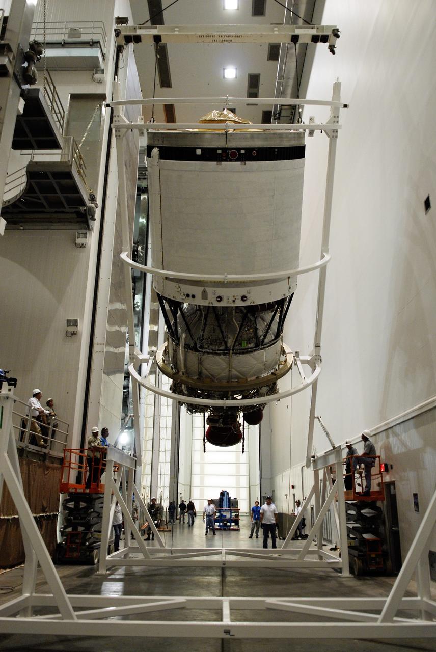 CAPE CANAVERAL, Fla. --   At Cape Canaveral Air Force Station, the second stage for the GOES-O Delta IV rocket is rotated vertically.  Once upright, the second stage will be moved into a work cell for processing.  GOES – O is one of a series of Geostationary Operational Environmental Satellites. The multimission GOES series N-P will be a vital contributor to weather, solar, and space operations and science. NASA and the National Oceanic and Atmospheric Administration, or NOAA, are actively engaged in a cooperative program to expand the existing GOES system with the launch of the GOES N-P satellites.  Photo credit: NASA/Kim Shiflett