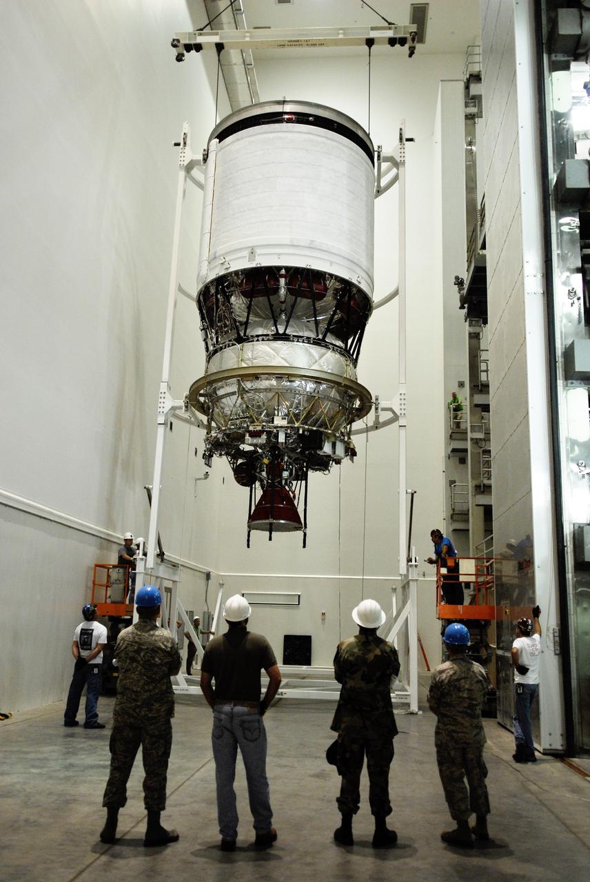 CAPE CANAVERAL, Fla. --   At Cape Canaveral Air Force Station, the second stage for the GOES-O Delta IV rocket is suspended vertically.  It will be moved into a work cell for processing.  GOES – O is one of a series of Geostationary Operational Environmental Satellites. The multimission GOES series N-P will be a vital contributor to weather, solar, and space operations and science. NASA and the National Oceanic and Atmospheric Administration, or NOAA, are actively engaged in a cooperative program to expand the existing GOES system with the launch of the GOES N-P satellites.  Photo credit: NASA/Kim Shiflett
