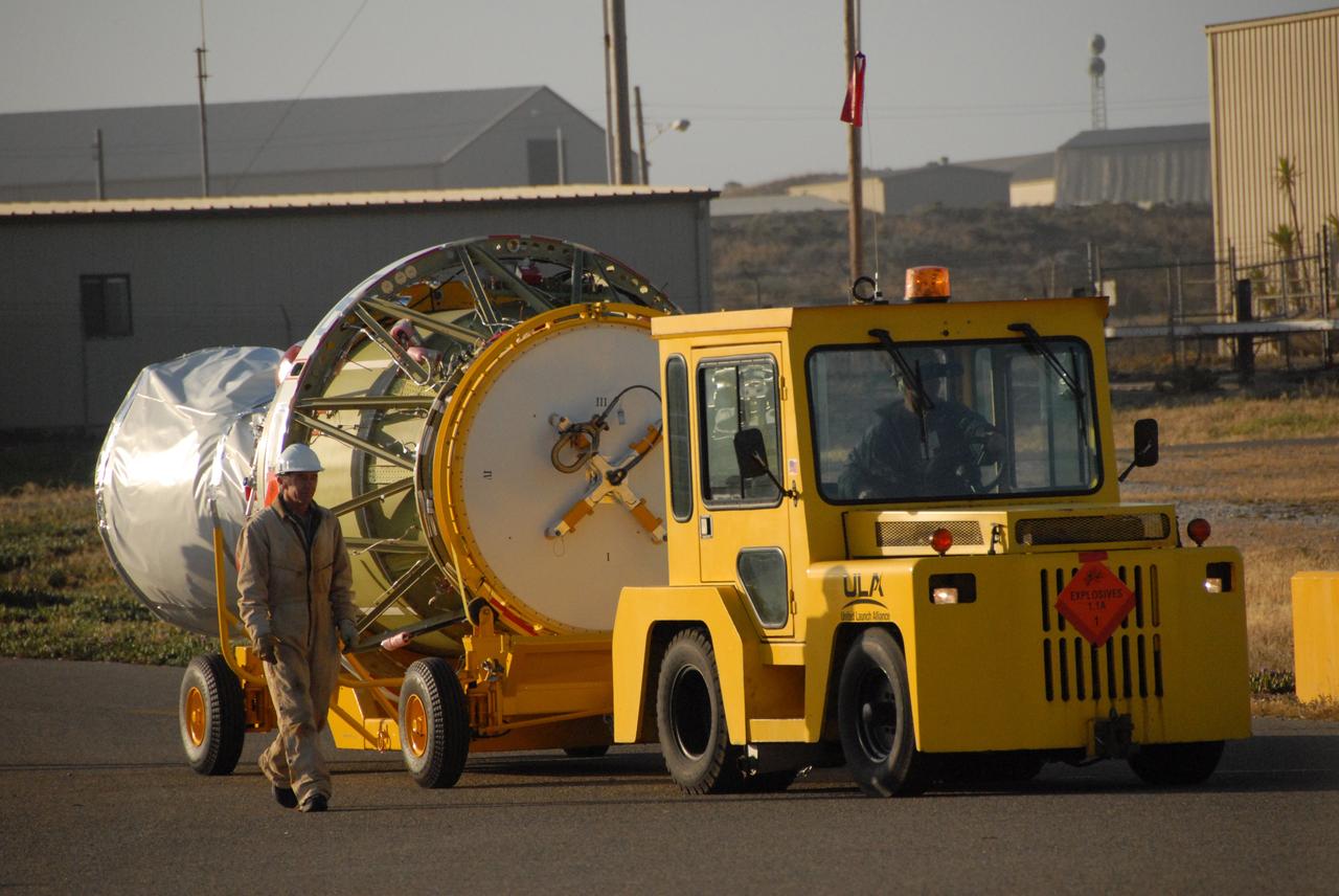 VANDENBERG AIR FORCE BASE, Calif. --   The Delta II second stage is transported onto Space Launch Complex 2 at Vandenberg Air Force Base in California.  It will be lifted into the mobile service tower and installed on the first stage for launch of the OSTM/Jason-2 spacecraft.  The OSTM, or Ocean Topography Mission, on the Jason-2 satellite is a follow-on to Jason-1. It will take oceanographic studies of sea surface height into an operational mode for continued climate forecasting research and science and industrial applications.  This satellite altimetry data will help determine ocean circulation, climate change and sea-level rise. OSTM is a joint effort by the National Oceanic and Atmospheric Administration, NASA, France’s Centre National d’Etudes Spatiales and the European Meteorological Satellite Organisation. OSTM/Jason-2 will be launched on June 20. Photo credit: NASA