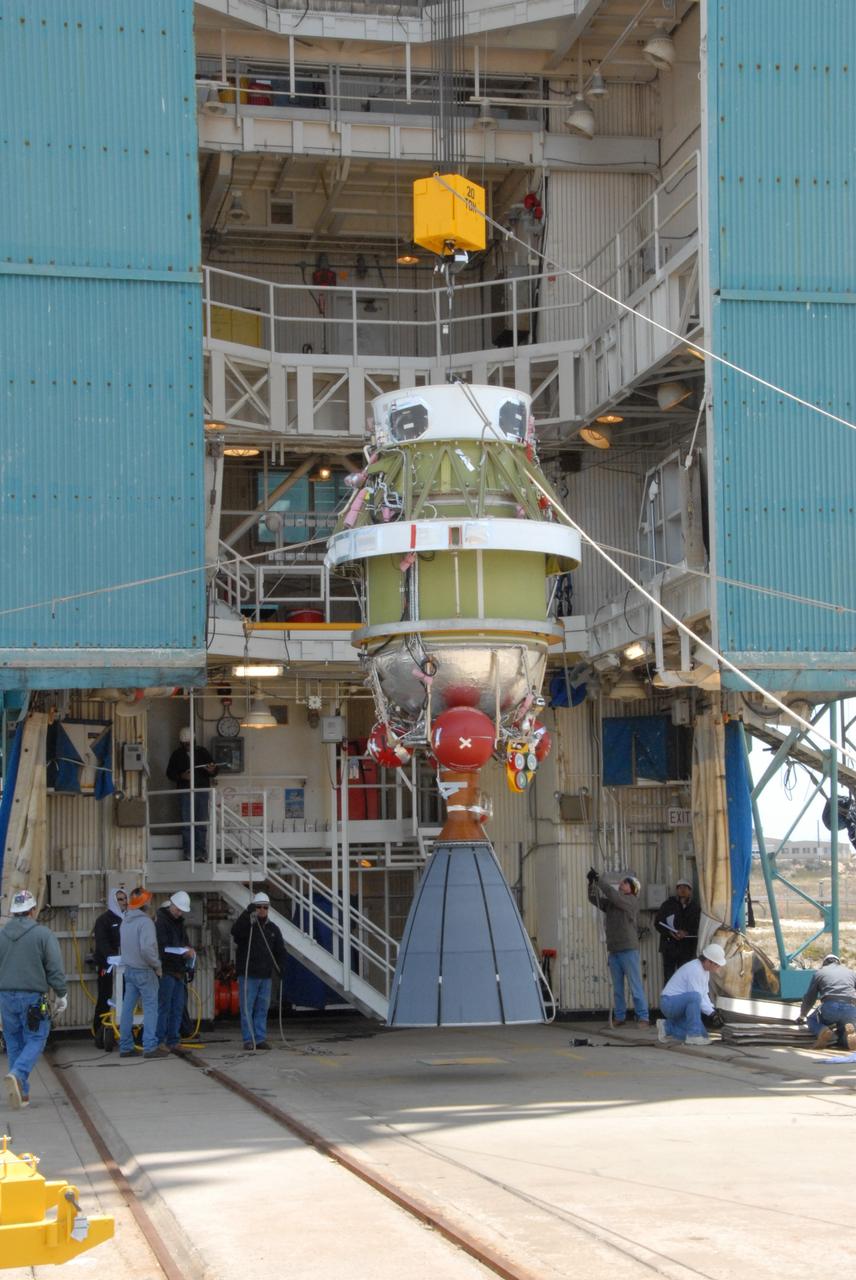 VANDENBERG AIR FORCE BASE, Calif. -- Suspended vertically, the Delta II second stage is ready to be lifted into the mobile service tower on Space Launch Complex 2 at Vandenberg Air Force Base in California. The second stage will be installed on the first stage for launch of the OSTM/Jason-2 spacecraft. The OSTM, or Ocean Topography Mission, on the Jason-2 satellite is a follow-on to Jason-1. It will take oceanographic studies of sea surface height into an operational mode for continued climate forecasting research and science and industrial applications.  This satellite altimetry data will help determine ocean circulation, climate change and sea-level rise. OSTM is a joint effort by the National Oceanic and Atmospheric Administration, NASA, France’s Centre National d’Etudes Spatiales and the European Meteorological Satellite Organisation. OSTM/Jason-2 will be launched on June 20. Photo credit: NASA