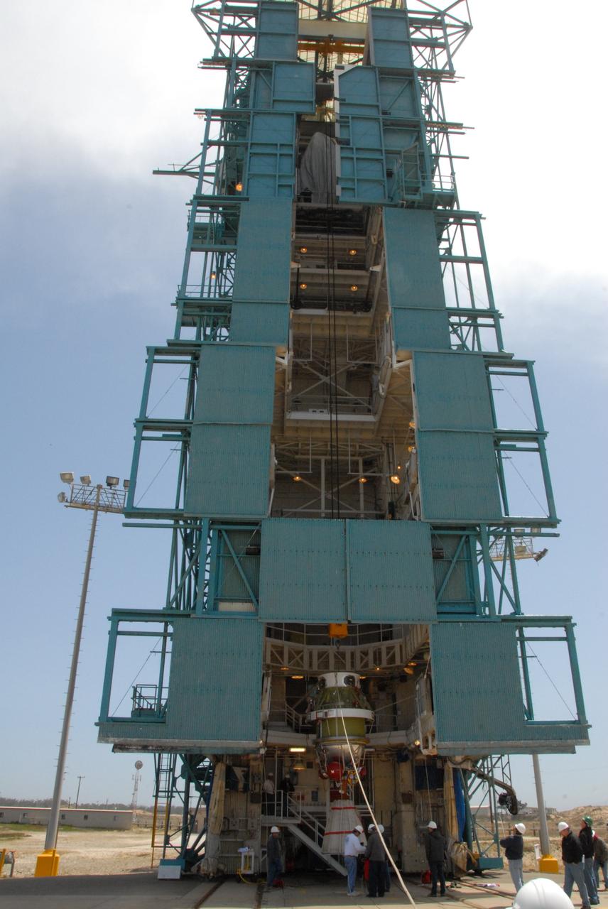 VANDENBERG AIR FORCE BASE, Calif. -- On Space Launch Complex 2 at Vandenberg Air Force Base in California, the Delta II second stage is ready to be lifted into the mobile service tower for installation on the first stage for launch of the OSTM/Jason-2 spacecraft. The OSTM, or Ocean Topography Mission, on the Jason-2 satellite is a follow-on to Jason-1. It will take oceanographic studies of sea surface height into an operational mode for continued climate forecasting research and science and industrial applications.  This satellite altimetry data will help determine ocean circulation, climate change and sea-level rise. OSTM is a joint effort by the National Oceanic and Atmospheric Administration, NASA, France’s Centre National d’Etudes Spatiales and the European Meteorological Satellite Organisation. OSTM/Jason-2 will be launched on June 20. Photo credit: NASA