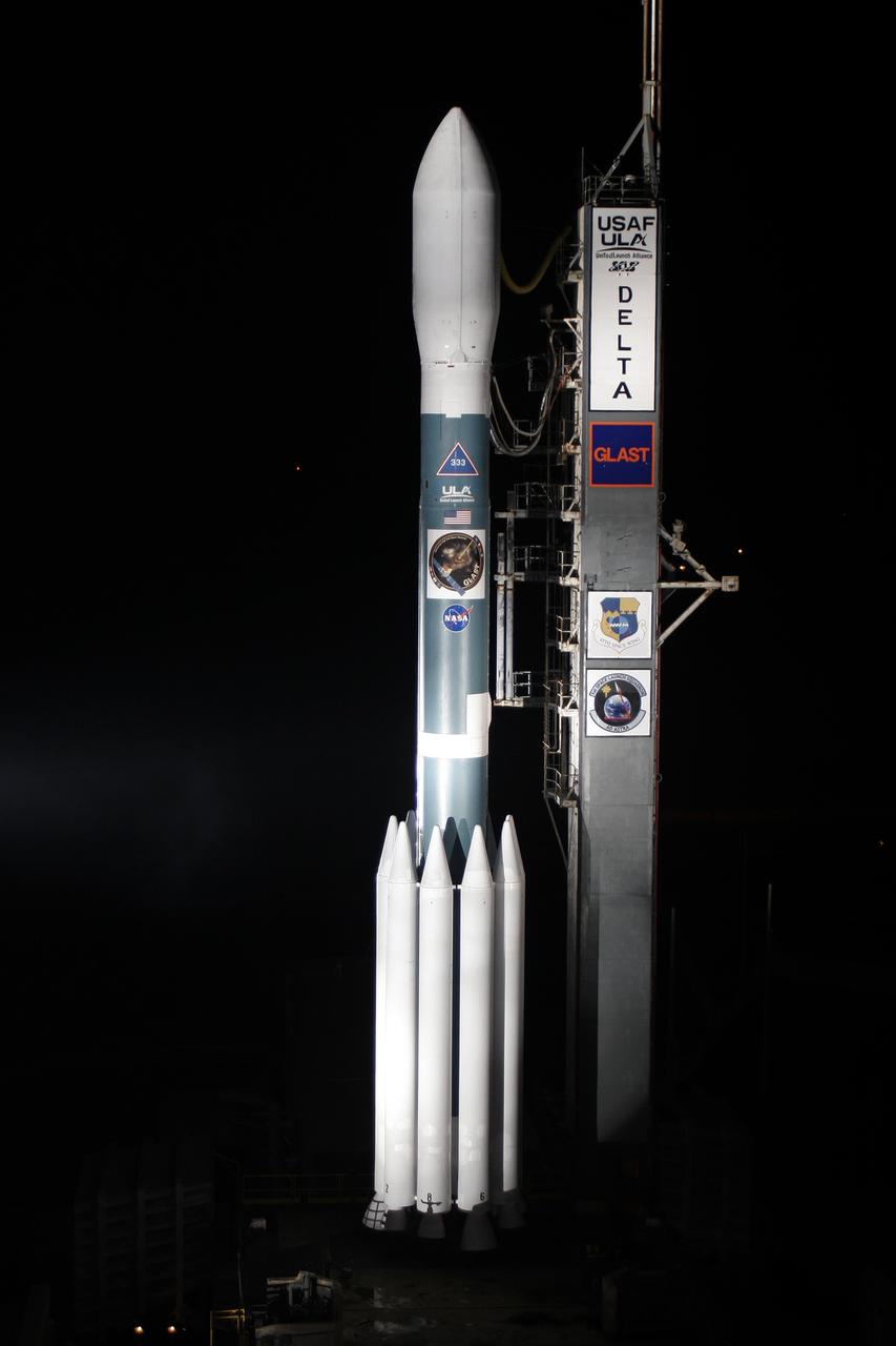 CAPE CANAVERAL, Fla.  --  On Cape Canaveral Air Force Station's Launch Pad 17-B, NASA's Gamma-ray Large Area Space Telescope , or GLAST, sits poised for launch atop the United Launch Alliance Delta II rocket after rollback of the mobile service tower.  GLAST is a powerful space observatory that will explore the universe's ultimate frontier, where nature harnesses forces and energies far beyond anything possible on Earth;  probe some of science's deepest questions, such as what our universe is made of, and search for new laws of physics; explain how black holes accelerate jets of material to nearly light speed; and help crack the mystery of stupendously powerful explosions known as gamma-ray bursts.  Launch is scheduled for 11:45 a.m. June 11.  Photo credit: Carleton Bailie photograph for United Launch Alliance