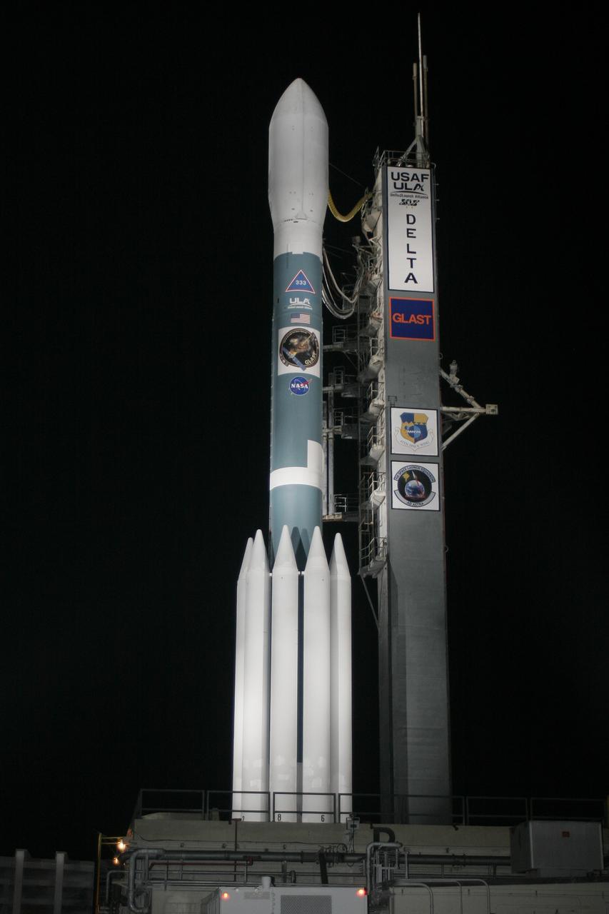 CAPE CANAVERAL, Fla.  --  On Cape Canaveral Air Force Station's Launch Pad 17-B, NASA's Gamma-ray Large Area Space Telescope , or GLAST, sits poised for launch atop the United Launch Alliance Delta II rocket after rollback of the mobile service tower.  GLAST is a powerful space observatory that will explore the universe's ultimate frontier, where nature harnesses forces and energies far beyond anything possible on Earth;  probe some of science's deepest questions, such as what our universe is made of, and search for new laws of physics; explain how black holes accelerate jets of material to nearly light speed; and help crack the mystery of stupendously powerful explosions known as gamma-ray bursts.  Launch is scheduled for 11:45 a.m. June 11.  Photo credit: Carleton Bailie photograph for United Launch Alliance