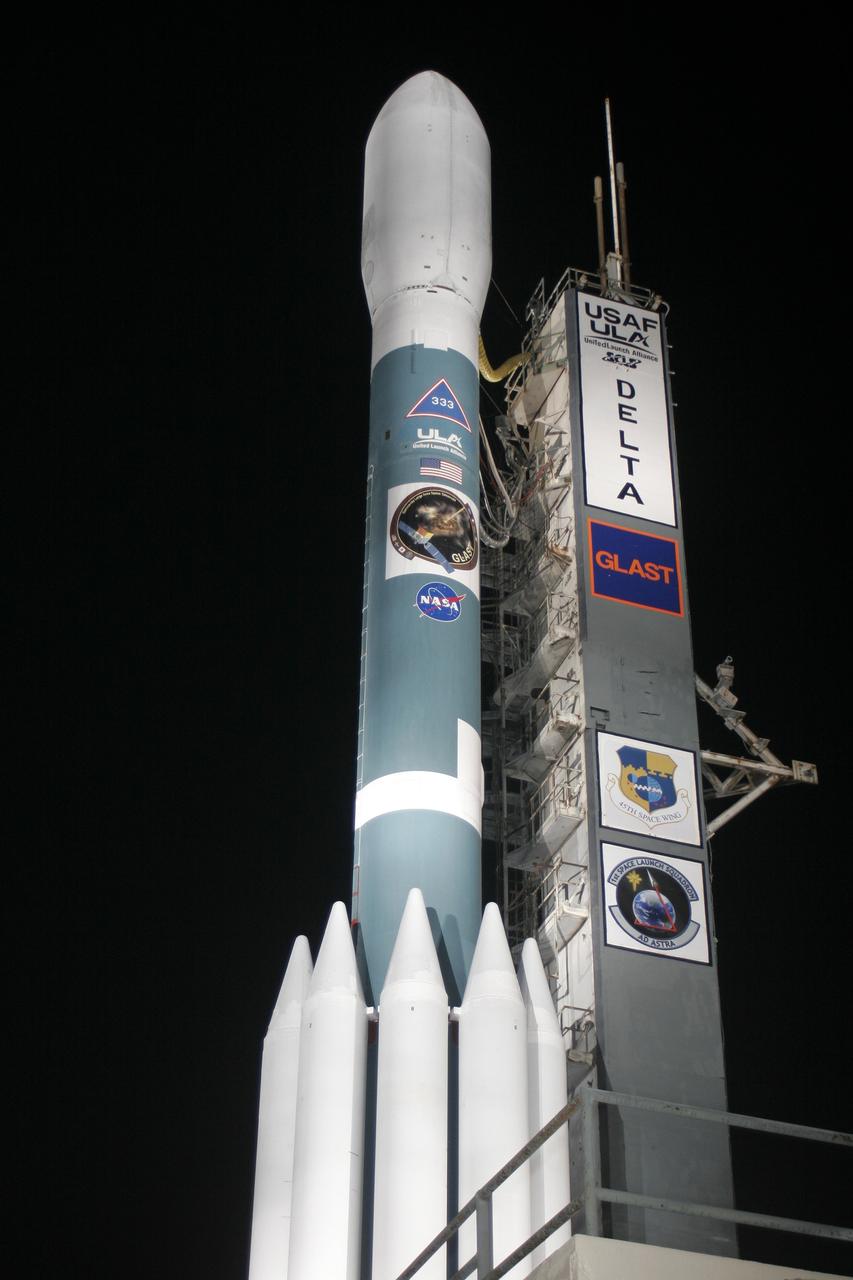 CAPE CANAVERAL, Fla.  --  On Cape Canaveral Air Force Station's Launch Pad 17-B, NASA's Gamma-ray Large Area Space Telescope , or GLAST, sits poised for launch atop the United Launch Alliance Delta II rocket after rollback of the mobile service tower.  GLAST is a powerful space observatory that will explore the universe's ultimate frontier, where nature harnesses forces and energies far beyond anything possible on Earth;  probe some of science's deepest questions, such as what our universe is made of, and search for new laws of physics; explain how black holes accelerate jets of material to nearly light speed; and help crack the mystery of stupendously powerful explosions known as gamma-ray bursts.  Launch is scheduled for 11:45 a.m. June 11.  Photo credit: Carleton Bailie photograph for United Launch Alliance