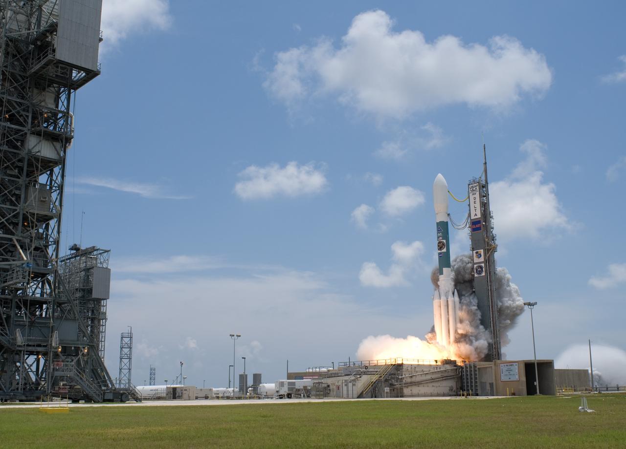 CAPE CANAVERAL, Fla.  --  Smoke is generated at liftoff of NASA's Gamma-Ray Large Area Space Telescope , or GLAST, aboard a Delta II rocket from Cape Canaveral Air Force Station's Launch Pad 17-B. Liftoff was at 12:05 p.m. EDT.  GLAST is a powerful space observatory that will explore the universe's ultimate frontier, where nature harnesses forces and energies far beyond anything possible on Earth;  probe some of science's deepest questions, such as what our universe is made of, and search for new laws of physics; explain how black holes accelerate jets of material to nearly light speed; and help crack the mystery of stupendously powerful explosions known as gamma-ray bursts.  Launch is scheduled for 11:45 a.m. June 11.  Photo credit: NASA/Tony Gray, Regina Mitchell-Ryall