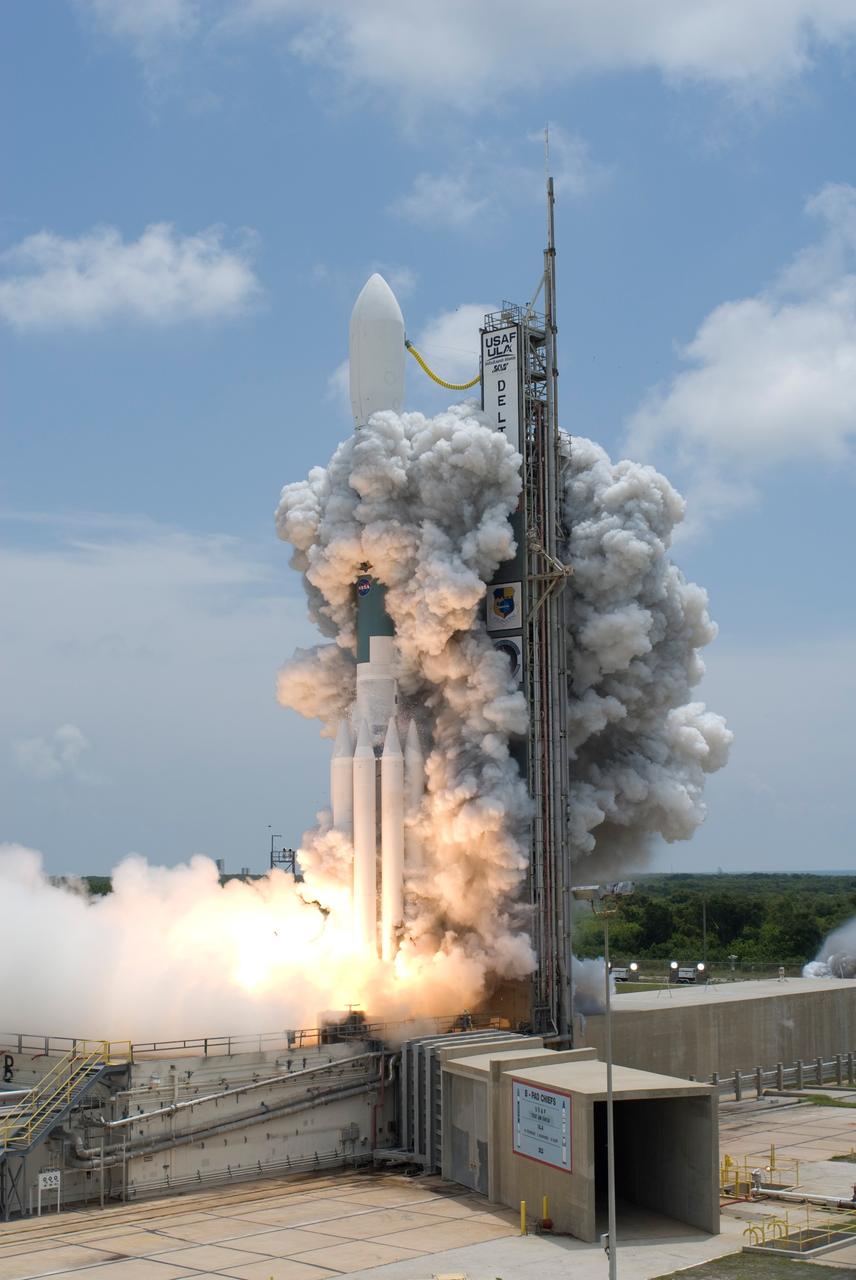 CAPE CANAVERAL, Fla.  -- Smoke rises to obscure the Delta II rocket with NASA's Gamma-Ray Large Area Space Telescope , or GLAST, aboard as it launches from Cape Canaveral Air Force Station's Launch Pad 17-B. Liftoff was at 12:05 p.m. EDT. GLAST is a powerful space observatory that will explore the universe's ultimate frontier, where nature harnesses forces and energies far beyond anything possible on Earth;  probe some of science's deepest questions, such as what our universe is made of, and search for new laws of physics; explain how black holes accelerate jets of material to nearly light speed; and help crack the mystery of stupendously powerful explosions known as gamma-ray bursts.  Launch is scheduled for 11:45 a.m. June 11.  Photo credit: NASA/Tony Gray, Regina Mitchell-Ryall