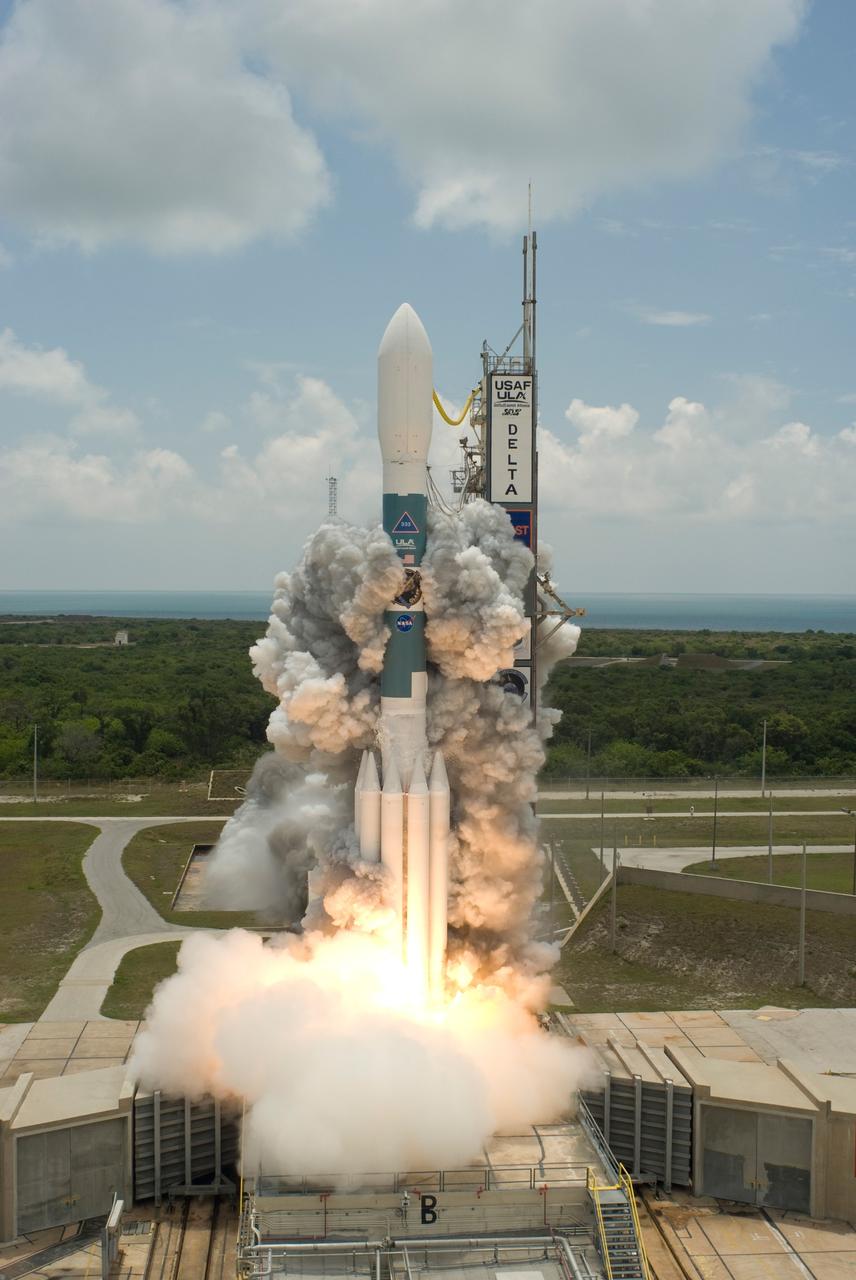 CAPE CANAVERAL, Fla.  -- Smoke appears to grab at the Delta II rocket as it launches from Cape Canaveral Air Force Station's Launch Pad 17-B with NASA's Gamma-Ray Large Area Space Telescope , or GLAST, aboard.  Liftoff was at 12:05 p.m. EDT.  GLAST is a powerful space observatory that will explore the universe's ultimate frontier, where nature harnesses forces and energies far beyond anything possible on Earth;  probe some of science's deepest questions, such as what our universe is made of, and search for new laws of physics; explain how black holes accelerate jets of material to nearly light speed; and help crack the mystery of stupendously powerful explosions known as gamma-ray bursts.  Launch is scheduled for 11:45 a.m. June 11.  Photo credit: NASA/Jerry Cannon, Robert Murray