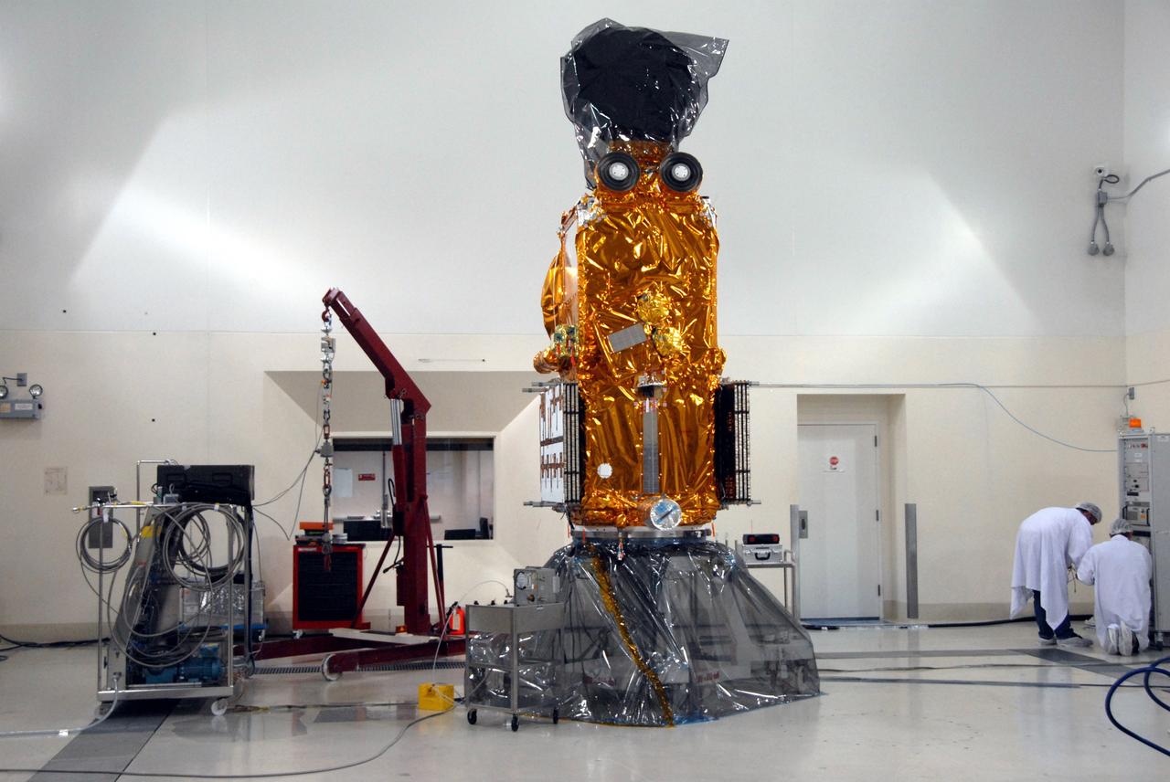 VANDENBERG AIR FORCE BASE, Calif. – The Ocean Surface Topography Mission, or OSTM/Jason 2, spacecraft is being wrapped, or bagged, before fueling, encapsulation and transfer to the launch pad. The launch of the OSTM/Jason 2 aboard a Delta II rocket is scheduled for Friday, June 20, from Vandenberg Air Force Base in California. The launch window extends from 12:46 a.m. to 12:55 a.m. PDT. The satellite will be placed in an 830-mile-high orbit at an inclination of 66 degrees after separating from the Delta II 55 minutes after liftoff. The five primary science instruments of the Ocean Surface Topography Mission aboard the Jason 2 spacecraft are dedicated to measuring ocean surface height. These measurements will be used to evaluate and forecast climate changes and improve weather forecasting. The results also are expected to help forecasters better predict hurricane intensity. Photo credit: NASA