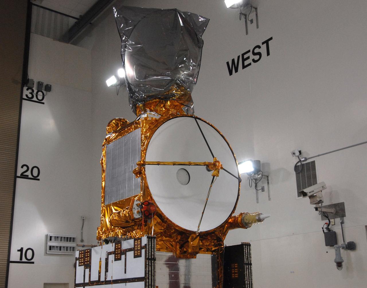 VANDENBERG AIR FORCE BASE, Calif. – Another look at the Ocean Surface Topography Mission, or OSTM/Jason 2, spacecraft from the opposite side before its fueling, encapsulation and transfer to the launch pad. The launch of the OSTM/Jason 2 aboard a Delta II rocket is scheduled for Friday, June 20, from Vandenberg Air Force Base in California. The launch window extends from 12:46 a.m. to 12:55 a.m. PDT. The satellite will be placed in an 830-mile-high orbit at an inclination of 66 degrees after separating from the Delta II 55 minutes after liftoff. The five primary science instruments of the Ocean Surface Topography Mission aboard the Jason 2 spacecraft are dedicated to measuring ocean surface height. These measurements will be used to evaluate and forecast climate changes and improve weather forecasting. The results also are expected to help forecasters better predict hurricane intensity. Photo credit: NASA