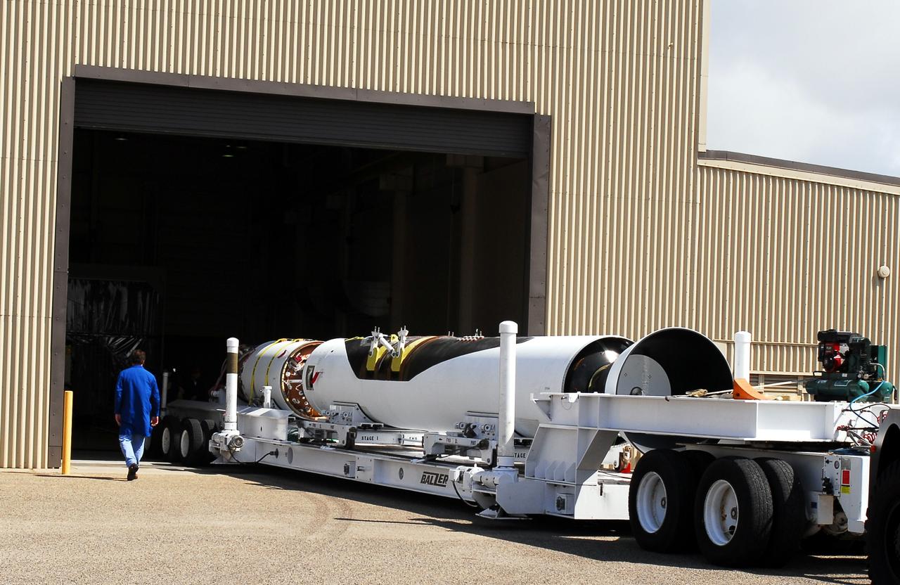 VANDENBERG AIR FORCE BASE, Calif. – In Building 1555, stage 1 and stage 2 of the Pegasus XL launch vehicle are temporarily mated. The Pegasus will launch NASA's Interstellar Boundary Explorer Mission, or IBEX, satellite from Kwajalein Island in the Marshall Islands, South Pacific. IBEX will make the first map of the boundary between the solar system and interstellar space. IBEX is the first mission designed to detect the edge of the solar system. As the solar wind from the sun flows out beyond Pluto, it collides with the material between the stars, forming a shock front. IBEX contains two neutral atom imagers designed to detect particles from the termination shock at the boundary between the solar system and interstellar space. IBEX also will study galactic cosmic rays, energetic particles from beyond the solar system that pose a health and safety hazard for humans exploring beyond Earth orbit. IBEX will make these observations from a highly elliptical orbit that takes it beyond the interference of the Earth's magnetosphere. Photo credit: NASA/Moran