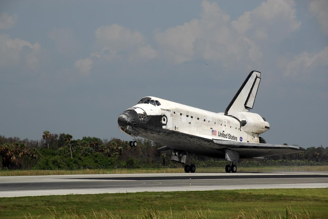 CAPE CANAVERAL, Fla. – In the 69th landing at NASA's Kennedy Space Center, space shuttle Discovery touches down on Runway 15 to end the STS-124 mission, a 14-day flight to the International Space Station. The main landing gear touched down at 11:15:19 a.m. EDT. The nose landing gear touched down at 11:15:30 a.m. and wheel stop was at 11:16:19 a.m. The mission completed 5.7 million miles. The STS-124 mission delivered the Japan Aerospace Exploration Agency's large Japanese Pressurized Module and its remote manipulator system to the space station. Photo credit: NASA/Kim Shiflett