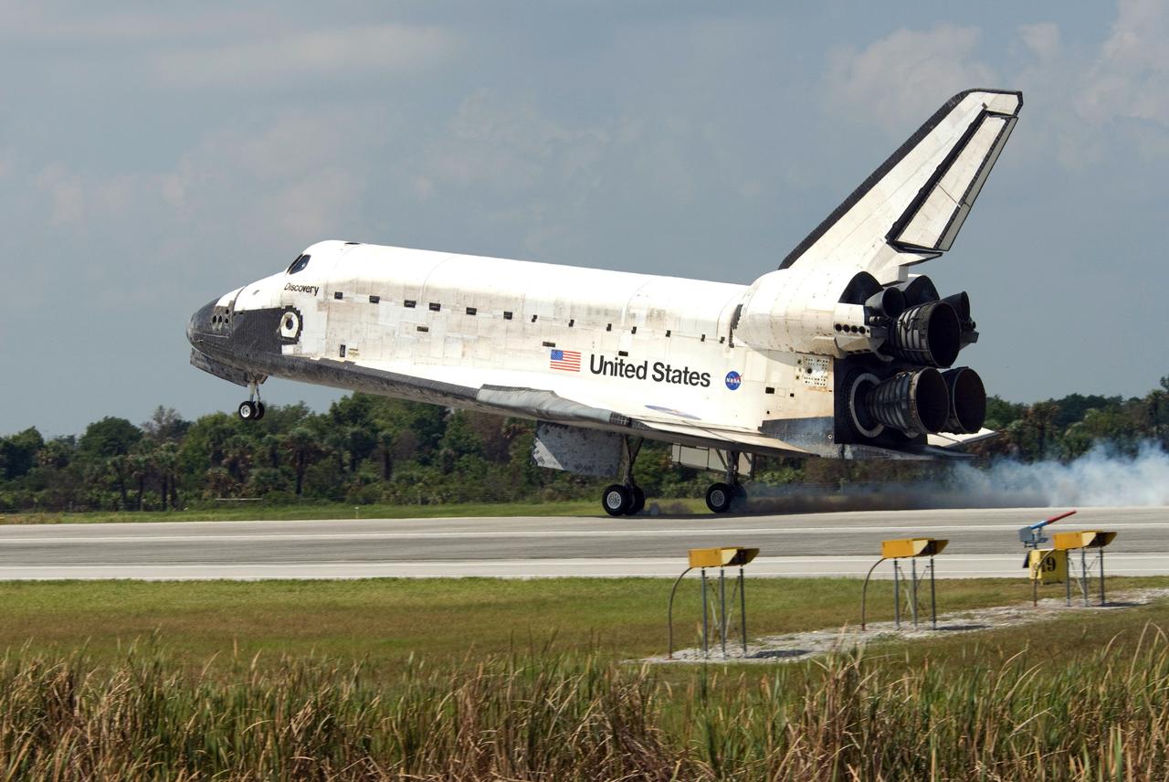 CAPE CANAVERAL, Fla. – Space shuttle Discovery touches down on Runway 15 at NASA's Kennedy Space Center to end the STS-124 mission, a 14-day flight to the International Space Station. This landing was the 69th at NASA's Kennedy Space Center. The main landing gear touched down at 11:15:19 a.m. EDT. The nose landing gear touched down at 11:15:30 a.m. and wheel stop was at 11:16:19 a.m. The mission completed 5.7 million miles. The STS-124 mission delivered the Japan Aerospace Exploration Agency's large Japanese Pressurized Module and its remote manipulator system to the space station. Photo credit: NASA/Mike Kerley