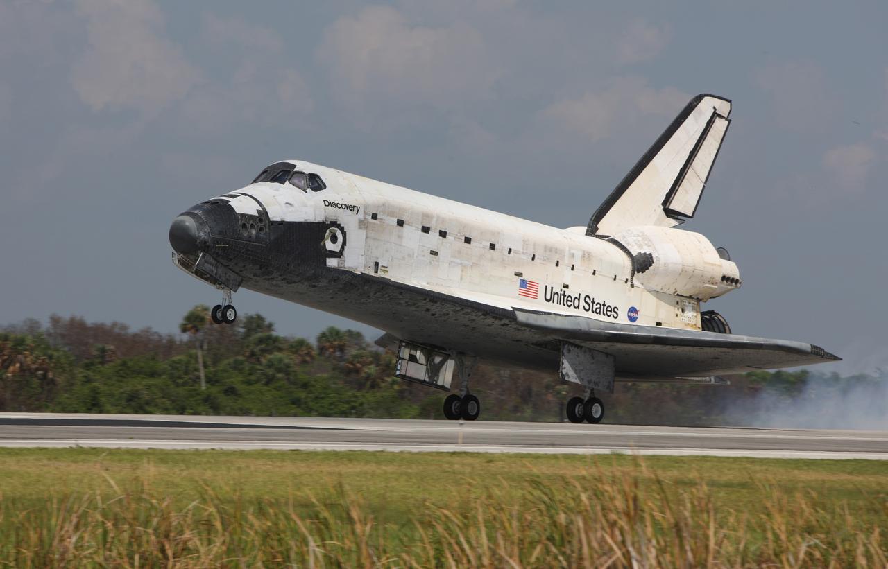 CAPE CANAVERAL, Fla. – Space shuttle Discovery touches down on Runway 15 at NASA's Kennedy Space Center to end the STS-124 mission, a 14-day flight to the International Space Station. This landing was the 69th at NASA's Kennedy Space Center. The main landing gear touched down at 11:15:19 a.m. EDT. The nose landing gear touched down at 11:15:30 a.m. and wheel stop was at 11:16:19 a.m. The mission completed 5.7 million miles. The STS-124 mission delivered the Japan Aerospace Exploration Agency's large Japanese Pressurized Module and its remote manipulator system to the space station. Photo courtesy of Scott Andrews