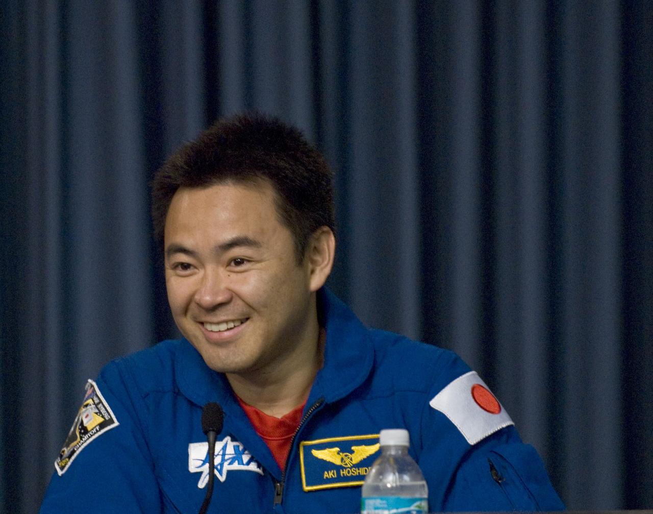 CAPE CANAVERAL, Fla. – Following the successful landing of space shuttle Discovery at NASA's Kennedy Space Center to end the 14-day, STS-124 mission, the crew sits for a press conference. Mission Specialist Akihiko Hoshide tells the media about his joy at entering the Japanese Pressurized Module after installation. Hoshide represents the Japan Aerospace Exploration Agency, or JAXA. The STS-124 mission delivered the JAXA Module and its remote manipulator system to the International Space Station. The landing was on time at 11:15 a.m. EDT. Photo credit: NASA/Kim Shiflett