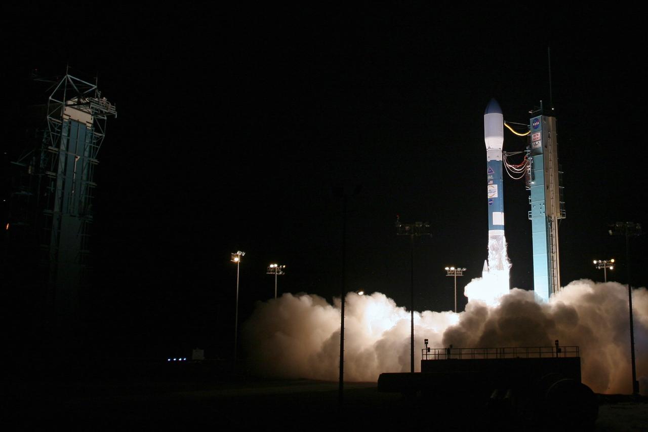 VANDENBERG AIR FORCE BASE, Calif.  –   Clouds of smoke and steam rise spread across the launch pad on Space Launch Complex-2 as the Delta II rocket lifts off with the Ocean Surface Topography Mission, or OSTM/Jason 2, spacecraft aboard. The OSTM/Jason 2 satellite will embark on a globe-circling voyage to continue charting sea level, a vital indicator of global climate change. The mission will return a vast amount of new data that will improve weather, climate and ocean forecasts. OSTM/Jason 2's expected lifetime of at least three years will extend into the next decade the continuous record of these data started in 1992 by NASA and the French space agency Centre National d'Etudes Spatiales, or CNES, with the TOPEX/Poseidon mission. The data collection was continued by the two agencies on Jason-1 in 2001. The launch window extends from 12:46 a.m. to 12:55 a.m. PDT. The satellite will be placed in an 830-mile-high orbit at an inclination of 66 degrees after separating from the Delta II 55 minutes after liftoff. Photo credit: Photograph by Carleton Bailie for United Launch Alliance