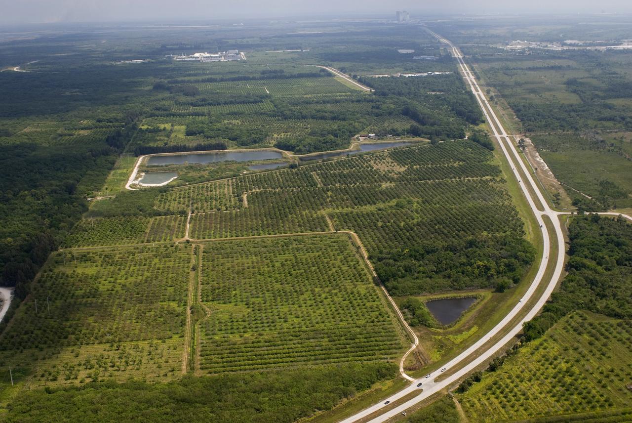 CAPE CANAVERAL, Fla.  –   This photo shows the area within NASA's Kennedy Space Center where a solar photovoltaic power generation system will be built as the result of an agreement between NASA and Florida Power & Light. The agreement is part of a new initiative that will cut reliance on fossil fuels and improve the environment by reducing greenhouse gas emissions.  The major facility will produce an estimated 10 megawatts of electrical power, which can serve roughly 3,000 homes.  A separate one-megawatt solar power facility will support the electrical needs of the center.