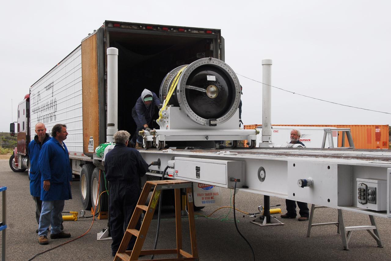 VANDENBERG AIR FORCE BASE, Calif. -- At Vandenberg AFB, the third stage of the Taurus rocket is offloaded from the truck onto an assembly integration trailer. The Taurus will launch the Orbiting Carbon Observatory, or OCO, in 2009. The OCO is a new Earth-orbiting mission sponsored by NASA's Earth System Science Pathfinder Program. Photo credit: NASA/Randy Beaudoin