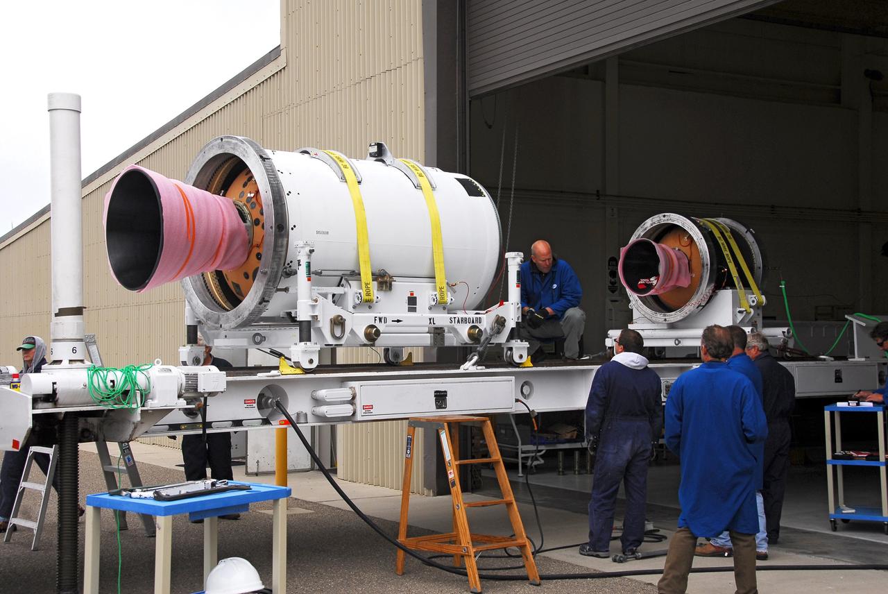 VANDENBERG AIR FORCE BASE, Calif. -- At Vandenberg AFB, the second stage of the Taurus rocket moves behind the third stage in front of the Building 1555's west bay. The Taurus will launch the Orbiting Carbon Observatory, or OCO, in 2009. The OCO is a new Earth-orbiting mission sponsored by NASA's Earth System Science Pathfinder Program. Photo credit: NASA/Randy Beaudoin