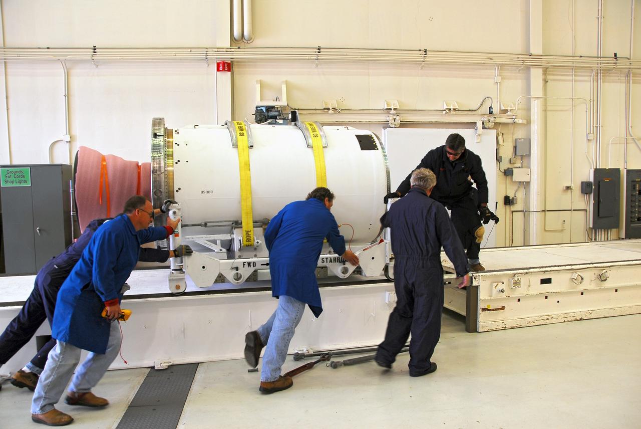 VANDENBERG AIR FORCE BASE, Calif. -- In Building 1555's west bay at Vandenberg AFB, the second stage of the Taurus rocket is moved onto the stationary rails. The Taurus will launch the Orbiting Carbon Observatory, or OCO, in 2009. The OCO is a new Earth-orbiting mission sponsored by NASA's Earth System Science Pathfinder Program. Photo credit: NASA/Randy Beaudoin