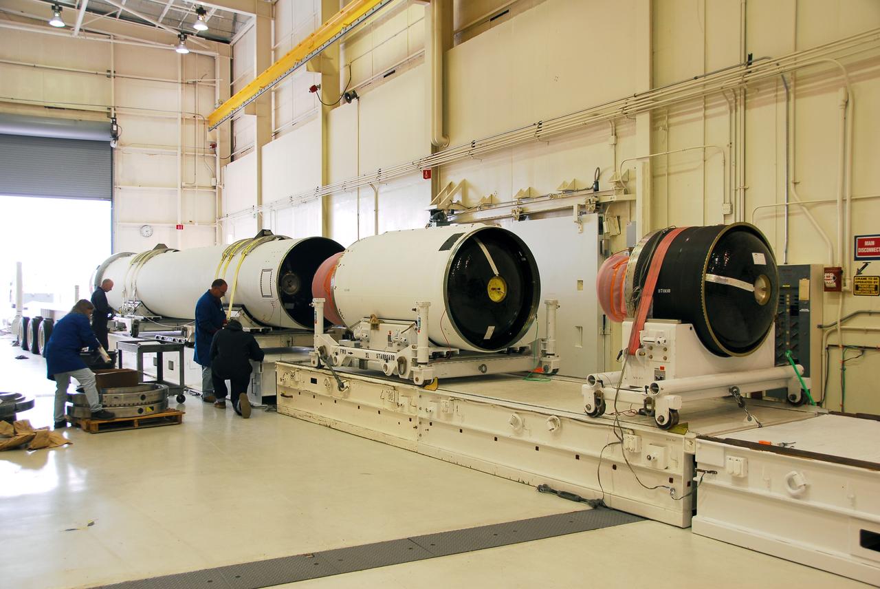 VANDENBERG AIR FORCE BASE, Calif. -- At Vandenberg AFB, the first stage of the Taurus rocket is being moved onto the stationary rails in Building 1555's west bay. The Taurus will launch the Orbiting Carbon Observatory, or OCO, in 2009. The OCO is a new Earth-orbiting mission sponsored by NASA's Earth System Science Pathfinder Program. Photo credit: NASA/Randy Beaudoin