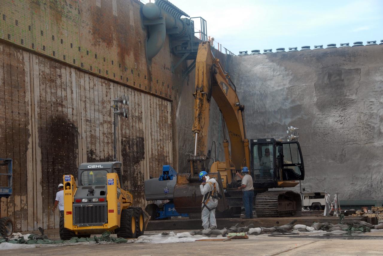 CAPE CANAVERAL, Fla. – This photos shows a close view of the area of repair in the flame trench on Launch Pad 39A at NASA's Kennedy Space Center. Damage to the trench occurred during the launch of Discovery on the STS-124 mission. A 75- by 20-foot section of the east wall was destroyed and debris scattered as far as the pad perimeter fence. Repairs are expected to be completed before the targeted Oct. 8 launch of Atlantis on the STS-125 mission. Photo credit: NASA/Jack Pfaller