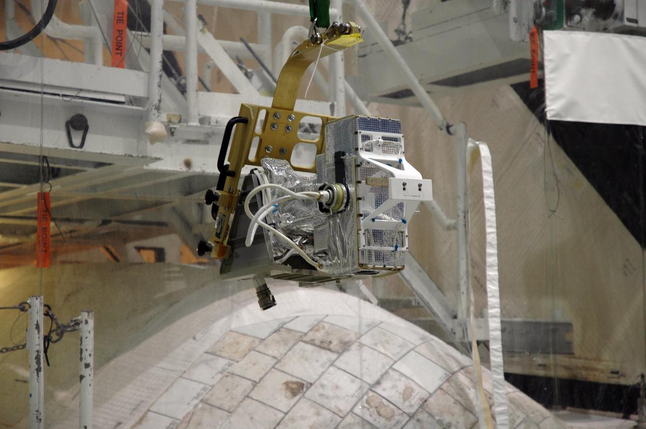 CAPE CANAVERAL, Fla. – A close-up of the camera pack to be installed on space shuttle Endeavour's orbiter boom sensor system. The work is being done in the Orbiter Processing Facility bay 2 at NASA's Kennedy Space Center. The scheduled launch vehicle for the STS-126 missions, Endeavour will deliver a multi-purpose logistics module to the International Space Station. Launch is targeted for Nov. 10. Endeavour is also the backup shuttle, if needed for rescue, for the STS-125 mission in October that will make repairs on NASA's Hubble Space Telescope. For that purpose, it is designated STS-400. Photo credit: NASA/Jim Grossmann
