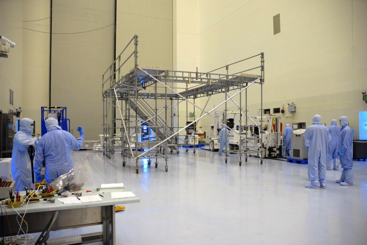CAPE CANAVERAL, Fla. – In the Payload Hazardous Servicing Facility at NASA's Kennedy Space Center, workers are constructing flight support system (FSS) access scaffolding that will be used to prepare the Hubble Space Telescope, or HST, carriers for the STS-125 servicing mission 4. The FSS will berth, secure and furnish power to Hubble and also contains the soft capture mechanism to be attached to the telescope. Upon completion of STS-125, the Hubble will provide even deeper and more detailed views of the Universe. The STS-125 mission will be the final space shuttle mission to the Hubble Space Telescope. Photo credit: NASA/Jack Pfaller