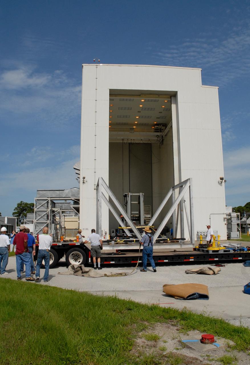 CAPE CANAVERAL, Fla. – The thermal vacuum fixture arrives at the Payload Hazardous Servicing Center at NASA's Kennedy Space Center. The fixture will be used to hold the carrier and flight support system for the STS-125 Hubble Space Telescope Servicing Mission 4. Space shuttle Atlantis is targeted to launch on the STS-125 mission Oct. 8. The mission crew will perform history-making, on-orbit “surgery” on two important science instruments aboard the telescope. After capturing the telescope, two teams of spacewalking astronauts will perform the repairs during five planned spacewalks. Photo credit: NASA/Jack Pfaller