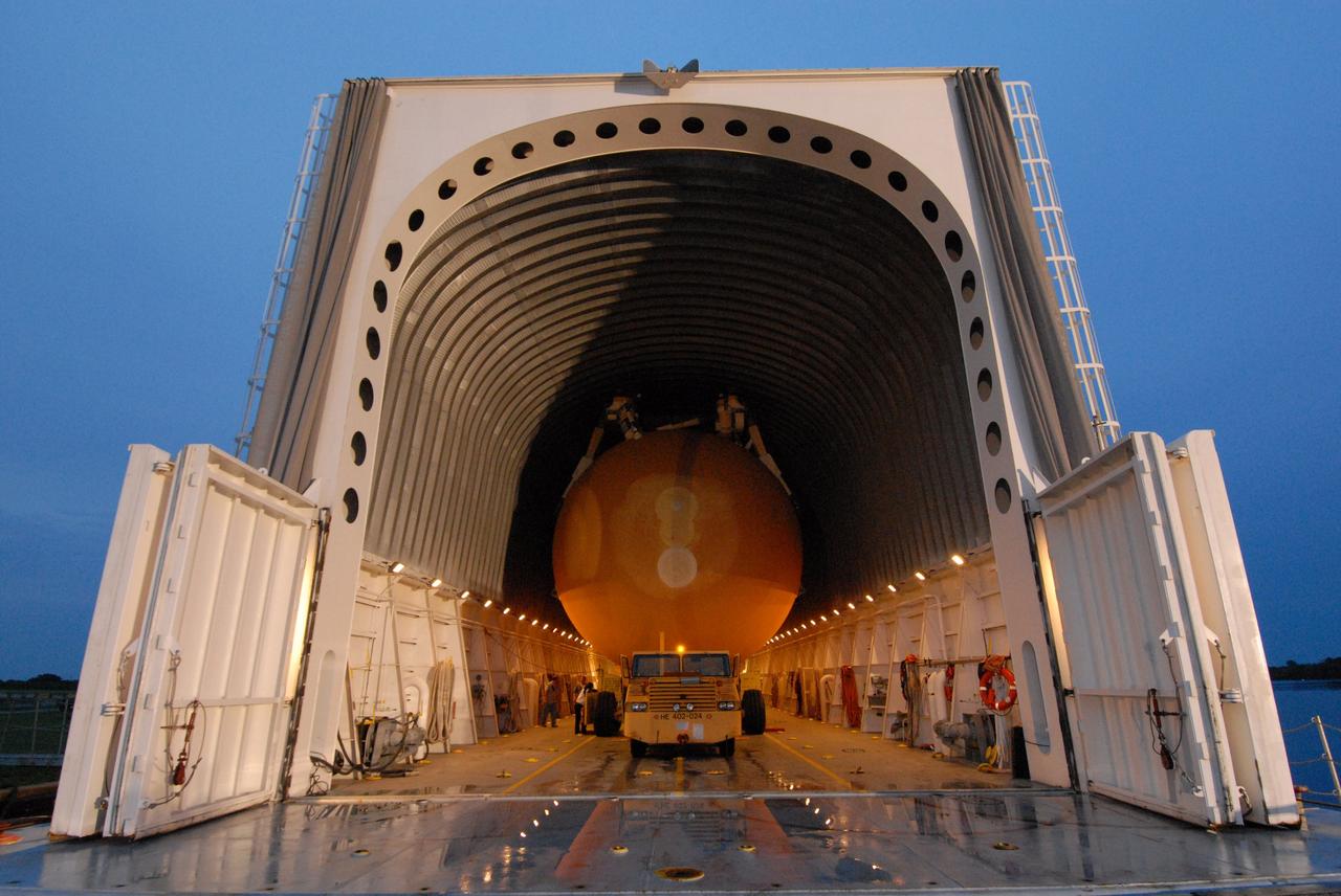 CAPE CANAVERAL, Fla. –   In the Launch Complex 39 Area at NASA's Kennedy Space Center, the external tank for space shuttle Atlantis' STS-125 mission to NASA's Hubble Space Telescope is ready to be moved off the Pegasus barge and moved to the Vehicle Assembly Building.   Inside the building, the tank will be raised to vertical, lifted and moved into a checkout cell.  Stacking of the tank and solid rocket boosters is scheduled for Aug. 7.  Atlantis is targeted to launch Oct. 8.  Photo credit: NASA/Amanda Diller