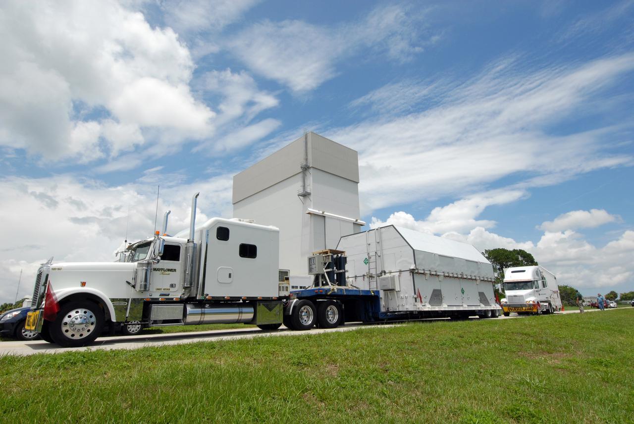 CAPE CANAVERAL, Fla. –  The first major flight hardware for space shuttle Atlantis' STS-125 mission to NASA's Hubble Space Telescope arrives at NASA's Kennedy Space Center to begin preparations for its targeted October launch.  The payload carriers will be prepared for the integration of telescope science instruments, both internal and external replacement components, as well as the flight support equipment to be used by the astronauts during the servicing mission.  The three payload carriers or pallets are the Flight Support System, the Super Lightweight Interchangeable Carrier and the Orbital Replacement Unit Carrier.  At the end of July, a fourth and final carrier, the Multi-Use Lightweight Equipment carrier will join the others in the Payload Hazardous Servicing Facility where the Hubble payload is being prepared for launch. Photo credit: NASA/Jack Pfaller