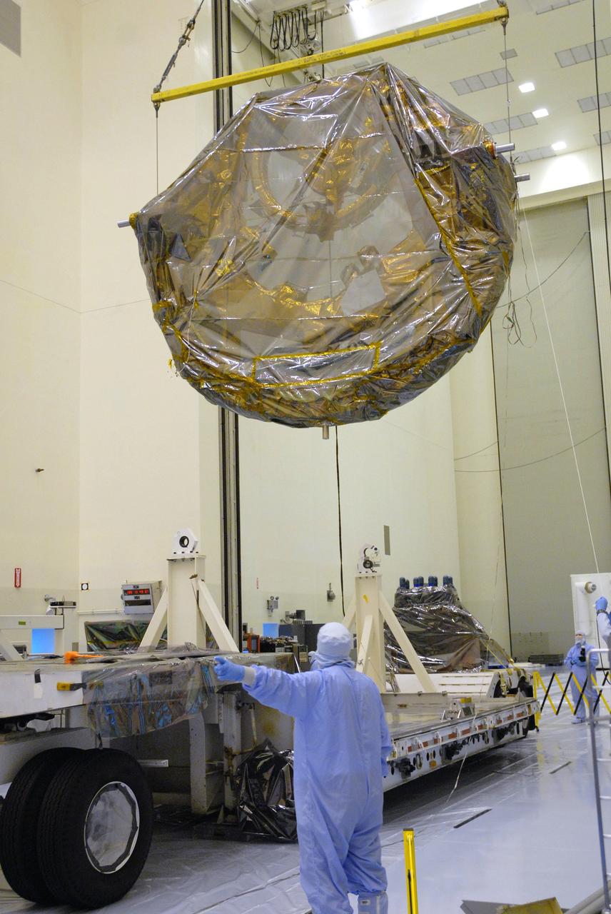 CAPE CANAVERAL, Fla. –    Inside the Payload Hazardous Servicing Facility at NASA's Kennedy Space Center, the newly arrived ground support equipment for the STS-125 Hubble Servicing Mission waits to be moved to a work stand.  The GSE are carriers, or pallets, that will hold equipment in space shuttle Atlantis’ payload bay. The carriers will be prepared for the integration of telescope science instruments, both internal and external replacement components, as well as the flight support equipment to be used by the astronauts during the servicing mission.  The three payload carriers or pallets are the Flight Support System, the Super Lightweight Interchangeable Carrier and the Orbital Replacement Unit Carrier.  At the end of July, a fourth and final carrier, the Multi-Use Lightweight Equipment carrier will join the others in the Payload Hazardous Servicing Facility where the Hubble payload is being prepared for launch. Photo credit: NASA/Cory Huston