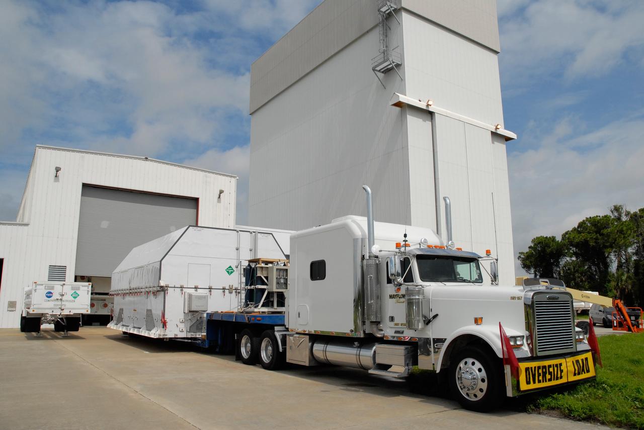 CAPE CANAVERAL, Fla. –  A second shipping container of major flight hardware for space shuttle Atlantis' STS-125 mission to NASA's Hubble Space Telescope is ready to be moved to the Payload Hazardous Servicing Facility at NASA's Kennedy Space Center to begin preparations for its targeted October launch.   The container holds the Super Lightweight Interchangeable Carrier and the Orbital Replacement Unit Carrier.Thepayload carriers will be prepared for the integration of telescope science instruments, both internal and external replacement components, as well as the flight support equipment to be used by the astronauts during the servicing mission.  The three payload carriers or pallets are the Flight Support System, the SLIC and the ORUC.  At the end of July, a fourth and final carrier, the Multi-Use Lightweight Equipment carrier will join the others in the Payload Hazardous Servicing Facility where the Hubble payload is being prepared for launch. Photo credit: NASA/Amanda Diller