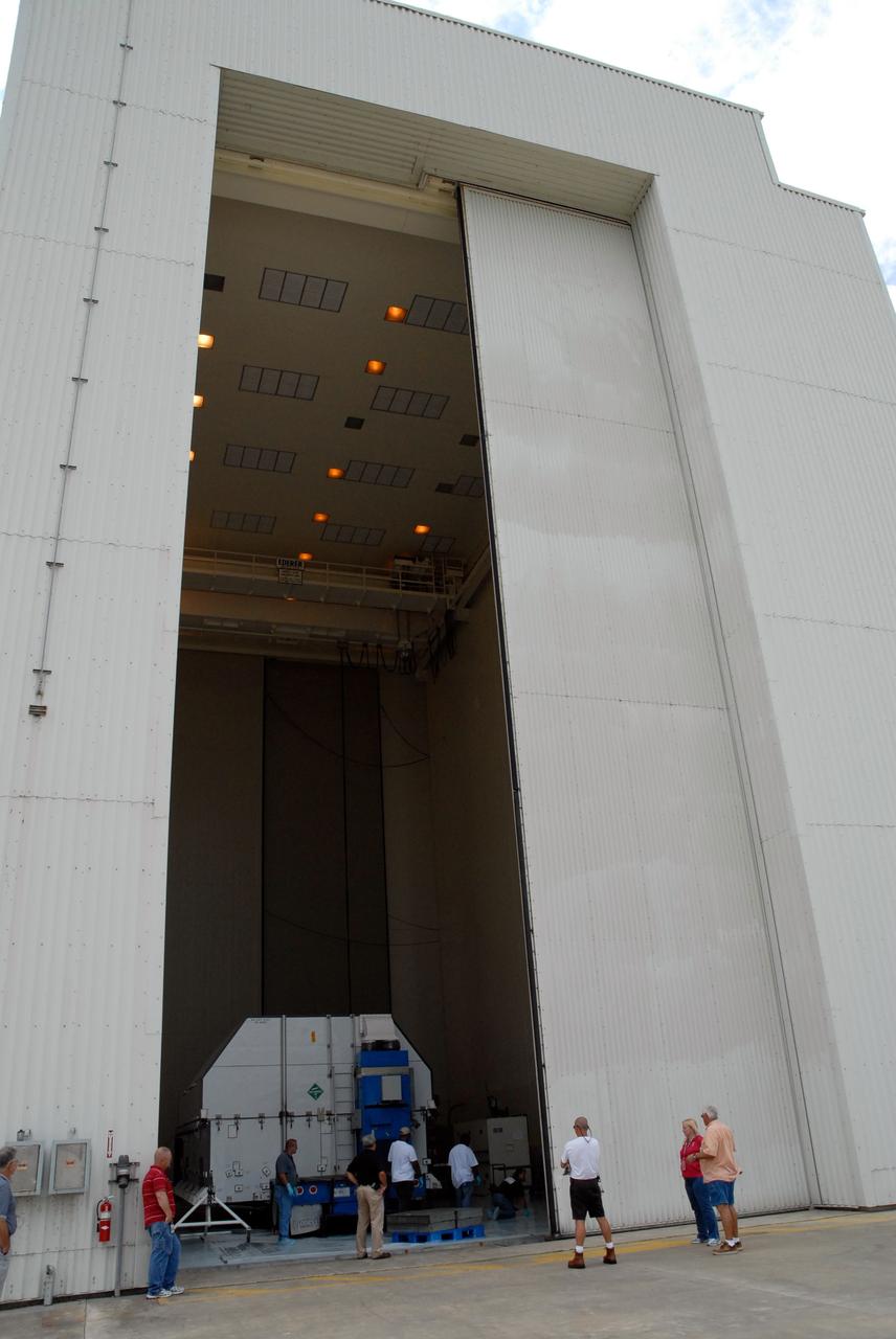 CAPE CANAVERAL, Fla. –   A second shipping container of major flight hardware for space shuttle Atlantis' STS-125 mission to NASA's Hubble Space Telescope comes to rest inside the airlock at the Payload Hazardous Servicing Facility at NASA's Kennedy Space Center. The container holds the Super Lightweight Interchangeable Carrier and the Orbital Replacement Unit Carrier.  In the facility, preparations will begin for its targeted October launch.  The payload carriers will be prepared for the integration of telescope science instruments, both internal and external replacement components, as well as the flight support equipment to be used by the astronauts during the servicing mission.  The three payload carriers or pallets are the Flight Support System, the SLIC and the ORUC.  At the end of July, a fourth and final carrier, the Multi-Use Lightweight Equipment carrier will join the others in the Payload Hazardous Servicing Facility where the Hubble payload is being prepared for launch. Photo credit: NASA/Amanda Diller