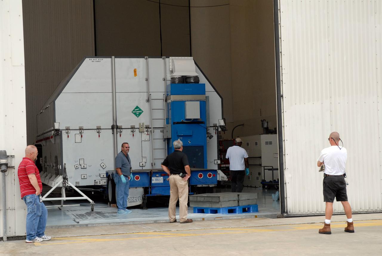 CAPE CANAVERAL, Fla. –   A second shipping container of major flight hardware for space shuttle Atlantis' STS-125 mission to NASA's Hubble Space Telescope comes to rest inside the airlock at the Payload Hazardous Servicing Facility at NASA's Kennedy Space Center. The container holds the Super Lightweight Interchangeable Carrier and the Orbital Replacement Unit Carrier.  In the facility, preparations will begin for its targeted October launch.  The payload carriers will be prepared for the integration of telescope science instruments, both internal and external replacement components, as well as the flight support equipment to be used by the astronauts during the servicing mission.  The three payload carriers or pallets are the Flight Support System, the SLIC and the ORUC.  At the end of July, a fourth and final carrier, the Multi-Use Lightweight Equipment carrier will join the others in the Payload Hazardous Servicing Facility where the Hubble payload is being prepared for launch. Photo credit: NASA/Amanda Diller