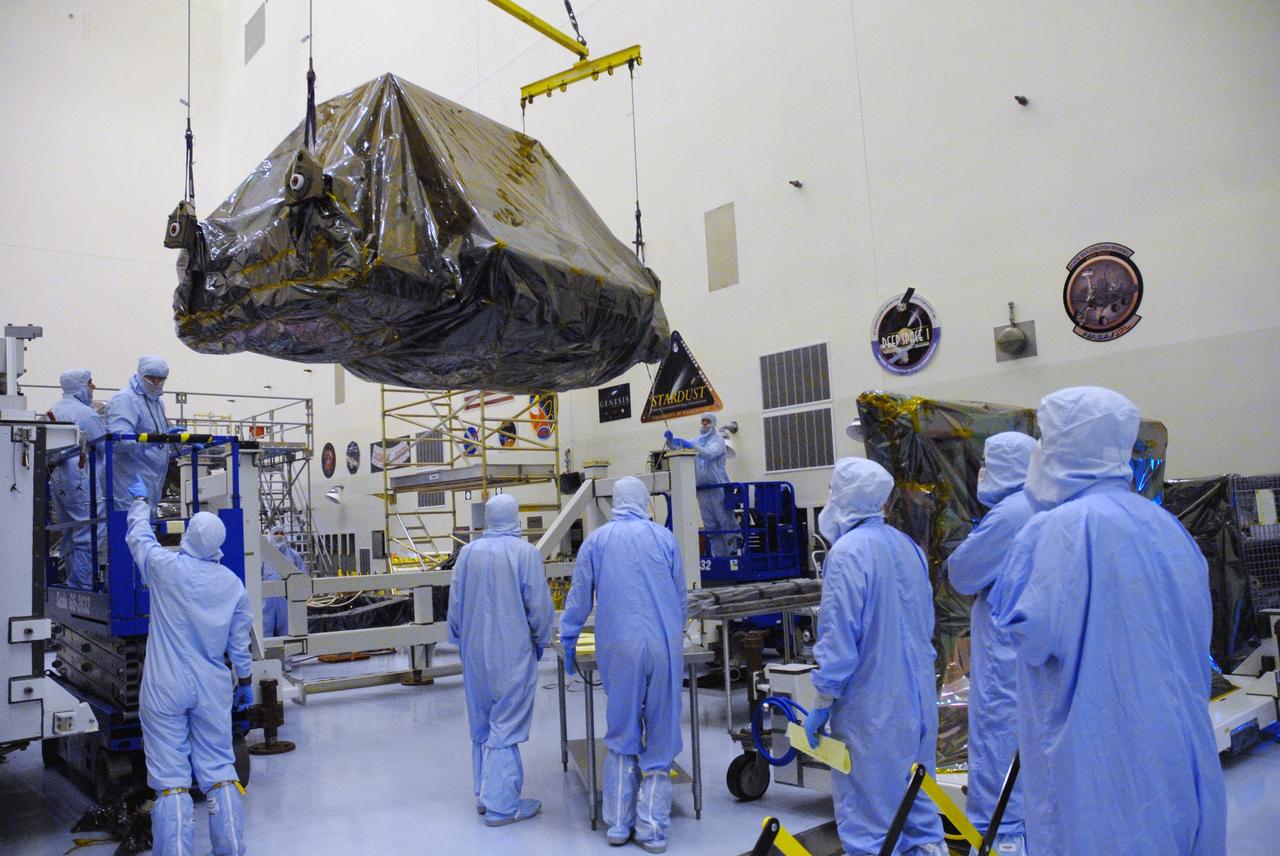 CAPE CANAVERAL, Fla. – In the high bay of the Payload Hazardous Servicing Facility at NASA's Kennedy Space Center, the Flight Support System for the Hubble Space Telescope is lifted from its transportation canister under the supervision of workers from NASA's Goddard Space Flight Center. The Flight Support System, or FSS, is one of four carriers supporting hardware for space shuttle Atlantis' STS-125 mission to service the telescope. The Super Lightweight Interchangeable Carrier, or SLIC, and the Orbital Replacement Unit Carrier, or ORUC, have also arrived at Kennedy. The Multi-Use Lightweight Equipment carrier will be delivered in late July. The carriers will be prepared for the integration of telescope science instruments, both internal and external replacement components, as well as the flight support equipment to be used by the astronauts during the Hubble servicing mission, targeted for launch Oct. 8. Photo credit: NASA/Jack Pfaller