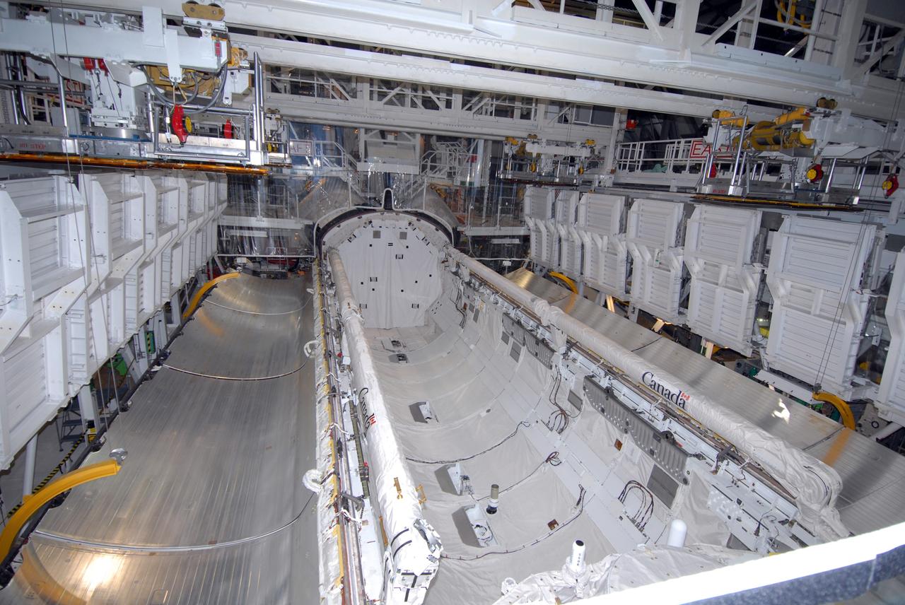CAPE CANAVERAL, Fla. – In Orbiter Processing Facility 1 at NASA's Kennedy Space Center, space shuttle Atlantis' payload bay has been thoroughly cleaned and is ready to receive the carriers transporting the instruments and equipment needed to service the Hubble Space Telescope. Atlantis is targeted to launch Oct. 8 on the STS-125 mission to service Hubble. The mission crew will perform history-making, on-orbit “surgery” on two important science instruments aboard the telescope. After capturing the telescope, two teams of spacewalking astronauts will perform the repairs during five planned spacewalks. Photo credit: NASA/Jack Pfaller