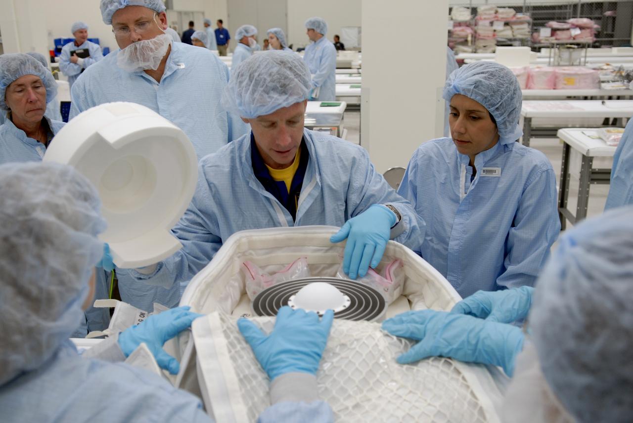 CAPE CANAVERAL, Fla. – In the Space Station Processing Facility at NASA's Kennedy Space Center, members of space shuttle Endeavour's STS-126 crew participate in a crew equipment interface test, or CEIT.  In the center is Commander Chris Ferguson. The CEIT provides hands-on experience with hardware and equipment slated to fly on their mission.  Endeavour will deliver a multi-purpose logistics module to the International Space Station on the STS-126 mission. Launch is targeted for Nov. 10.  Photo credit: NASA/Kim Shiflett