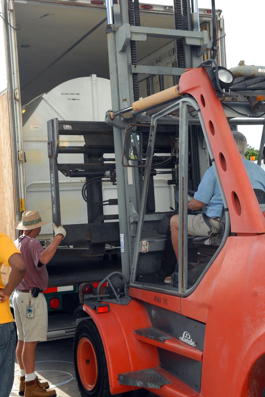 CAPE CANAVERAL, Fla. –  The Fine Guidance Sensor, or FGS, is offloaded from the truck at NASA's Kennedy Space Center for the STS-125 mission.  The FGS will be integrated onto the Orbital Replacement Unit carrier in the clean room of the Payload Hazardous Servicing Facility. The sensor will extend the life of the pointing control system on the Hubble Space Telescope. On the mission, this FGS will replace one of the three sensors that is failing and thus outfit the telescope with two completely healthy units, which are needed.  A third, older FGS aboard the telescope will provide additional target-pointing efficiency and redundancy.  Space shuttle Atlantis is targeted to launch on the STS-125 mission Oct. 8.  Photo credit: NASA/Jack Pfaller