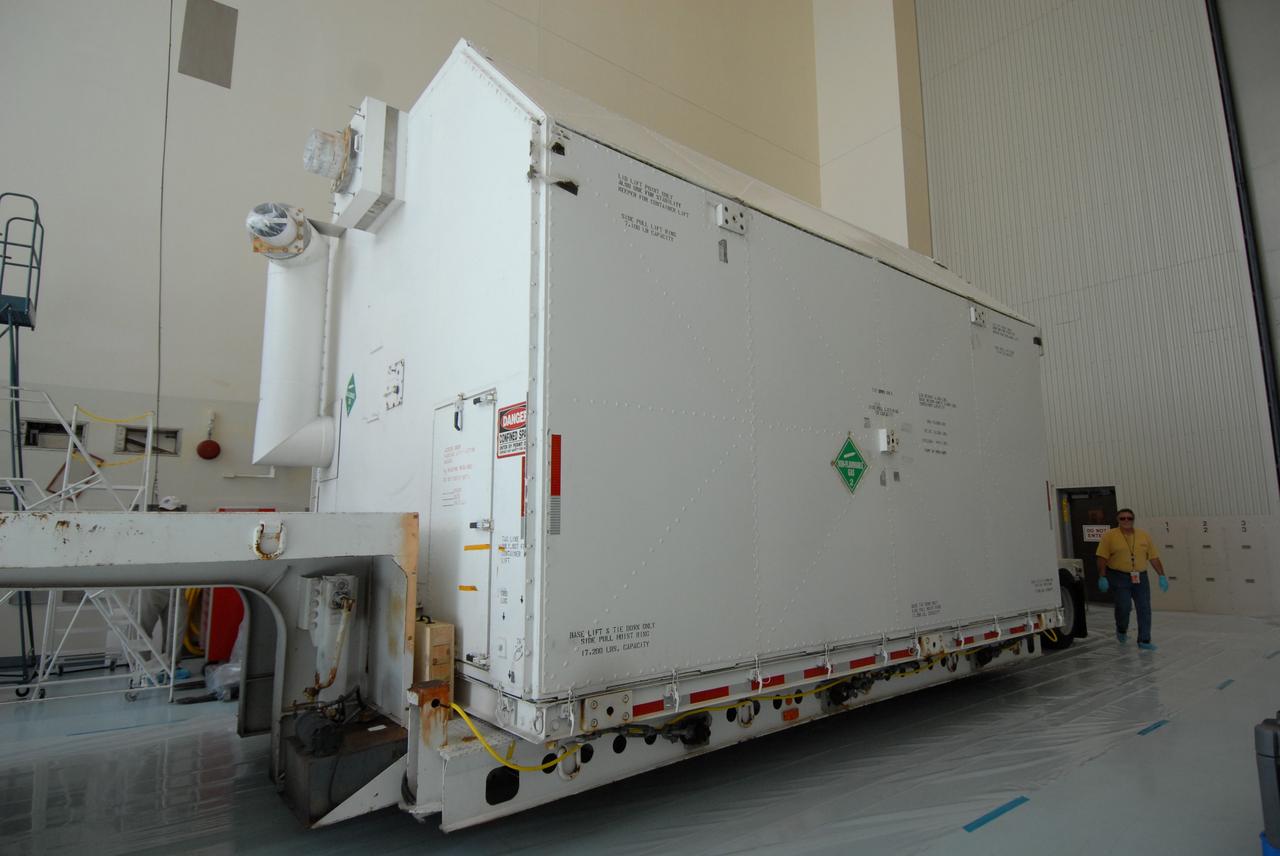 CAPE CANAVERAL, Fla. –  The shipping container with the Multi-Use Lightweight Equipment (MULE) carrier inside comes to rest in the airlock in the Payload Hazardous Servicing Facility at NASA's Kennedy Space Center.  The cover will be removed in the airlock. The MULE is part of the payload for the fifth and final shuttle servicing mission to NASA's Hubble Space Telescope, STS-125. The MULE is part of the payload for the fifth and final shuttle servicing mission to NASA's Hubble Space Telescope, STS-125. The MULE is part of the payload for the fifth and final shuttle servicing mission to NASA's Hubble Space Telescope, STS-125.  The MULE is part of the payload for the fifth and final shuttle servicing mission to NASA's Hubble Space Telescope, STS-125. The MULE is part of the payload for the fifth and final shuttle servicing mission to NASA's Hubble Space Telescope, STS-125. The MULE carrier will join the Flight Support System, the Super Lightweight Interchangeable Carrier and the Orbital Replacement Unit Carrier in the Payload Hazardous Servicing Facility where the Hubble payload is being prepared for launch. The Relative Navigation Sensors and the New Outer Blanket Layers will be on the MULE. The payload is scheduled to go to Launch Pad 39A in mid-September to be installed into Atlantis' payload bay.  Atlantis is targeted to launch Oct. 8 at 1:34 a.m. EDT. .Photo credit: NASA/Amanda Diller