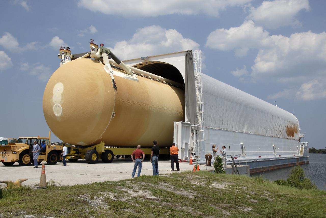 CAPE CANAVERAL, Fla. – The external fuel tank for space shuttle Endeavour's STS-126 mission to the International Space Station is offloaded from the Pegasus barge at the turn basin dock near the Vehicle Assembly Building at NASA's Kennedy Space Center. The tank arrived earlier after a six-day ocean voyage towed by a solid rocket booster retrieval ship from the Michoud Assembly Facility near New Orleans. The tank will be transported to the VAB transfer aisle, lifted and lowered into a checkout cell. The STS-126 mission will deliver a Multi-Purpose Logistics Module to the International Space Station. Launch is targeted for Nov. 10. Photo credit: NASA/Kim Shiflett
