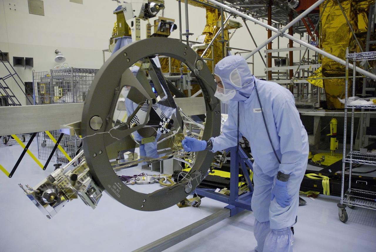 CAPE CANAVERAL, Fla. – In the Payload Hazardous Servicing Facility at NASA's Kennedy Space Center, the Soft Capture Mechanism (SCM), part of the Soft Capture and Rendezvous System, or SCRS, is being prepared for transfer to the Flight Support System, or FSS, carrier. The SCRS will enable the future rendezvous, capture and safe disposal of NASA's Hubble Space Telescope by either a crewed or robotic mission. The ring-like device attaches to Hubble’s aft bulkhead. The SCRS greatly increases the current shuttle capture interfaces on Hubble, therefore significantly reducing the rendezvous and capture design complexities associated with the disposal mission. The FSS will join the Multi-Use Lightweight Equipment, or MULE, carrier, the Super Lightweight Interchangeable Carrier and the Orbital Replacement Unit Carrier as payload on space shuttle Atlantis's STS-125 mission. The payload is scheduled to go to Launch Pad 39A in mid-September to be installed into Atlantis' payload bay. Atlantis is targeted to launch Oct. 8 at 1:34 a.m. EDT. Photo credit: NASA/Troy Cryder