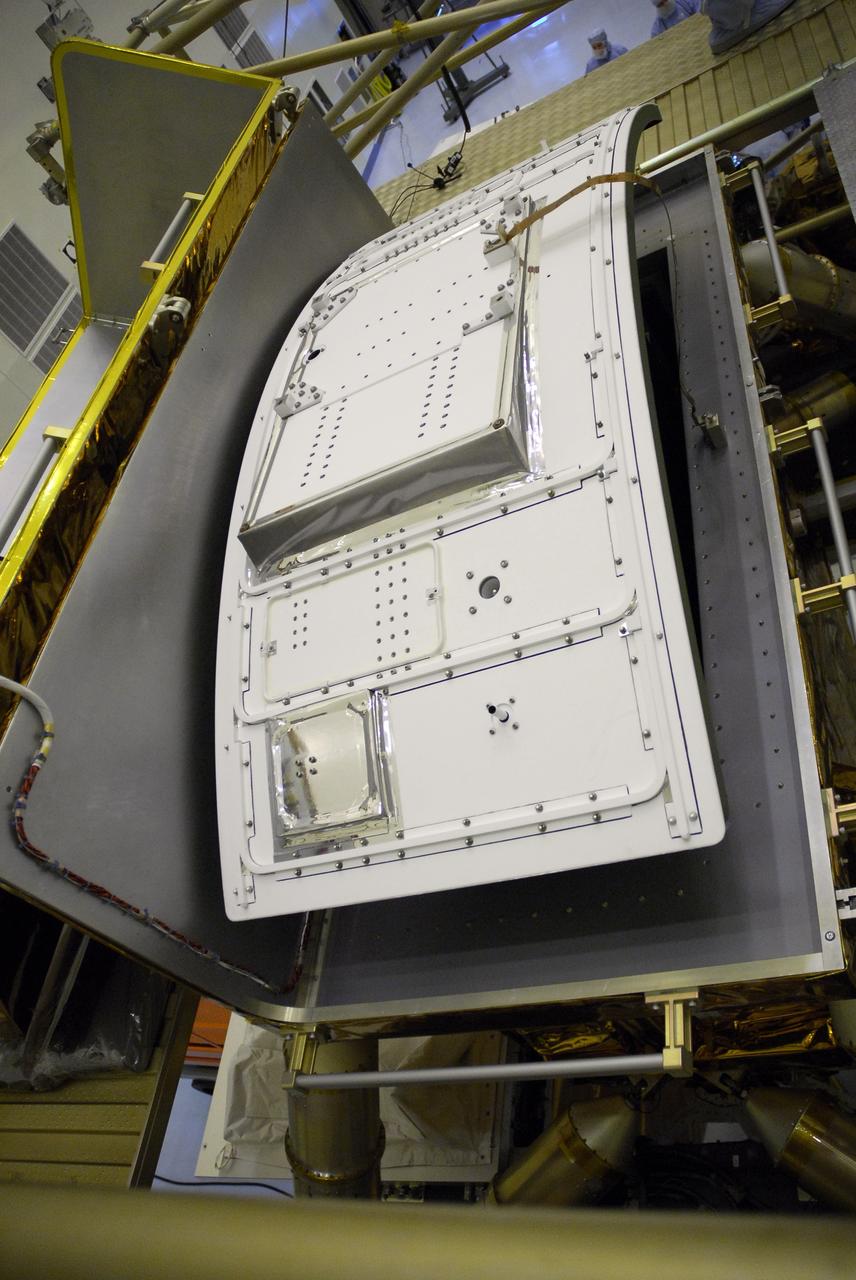 CAPE CANAVERAL, Fla. –  In the Payload Hazardous Servicing Facility at NASA's Kennedy Space Center, the Wide Field Camera 3, or WFC3, waits to be transferred to the Super Lightweight Interchangeable Carrier.  WFC3 is part of the payload on space shuttle Atlantis' STS-125 mission for the fifth and final Hubble servicing flight to NASA's Hubble Space Telescope. The part shown here is the radiator, the "outside" of WFC3 that will be exposed to space and will expel heat out of Hubble and into space through black body radiation.  As Hubble enters the last stage of its life, WFC3 will be Hubble's next evolutionary step, allowing Hubble to peer ever further into the mysteries of the cosmos. WFC3 will study a diverse range of objects and phenomena, from young and extremely distant galaxies, to much more nearby stellar systems, to objects within our very own solar system. WFC3 will take the place of Wide Field Planetary Camera 2, which astronauts will bring back to Earth aboard the shuttle. Launch of Atlantis is targeted at 1:34 a.m. EDT Oct. 8.  Photo credit: NASA/Amanda Diller