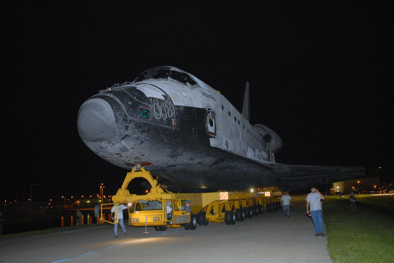 CAPE CANAVERAL, Fla. – After rolling out of the Orbiter Processing Facility bay 1 at NASA's Kennedy Space Center, space shuttle Atlantis rolls to the Vehicle Assembly Building. In the VAB, Atlantis will be attached to its external fuel tank and twin solid rocket boosters. After additional preparations are made, the shuttle will be rolled out to Launch Pad 39A to prepare for launch on the STS-125 mission targeted for Oct. 8. Photo credit: NASA/Jack Pfaller