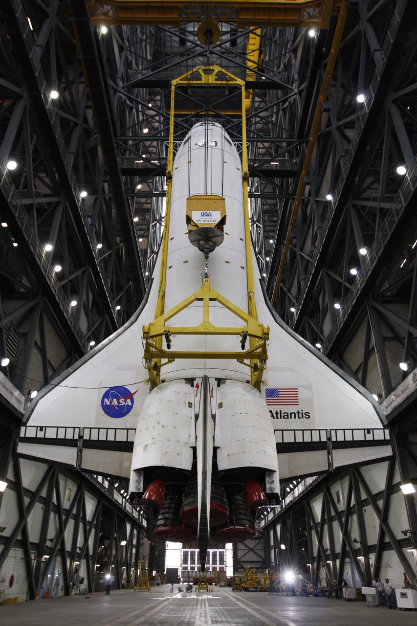 CAPE CANAVERAL, Fla. – Suspended above the transfer aisle in the Vehicle Assembly Building at NASA's Kennedy Space Center, space shuttle Atlantis is ready to be lifted into high bay 3 and stacked with its external fuel tank and twin solid rocket boosters. After additional preparations are made, the shuttle will be rolled out to Launch Pad 39A to prepare for launch on the STS-125 mission targeted for 1:34 a.m. EDT Oct. 8. Photo credit: NASA/Dimitri Gerondidakis