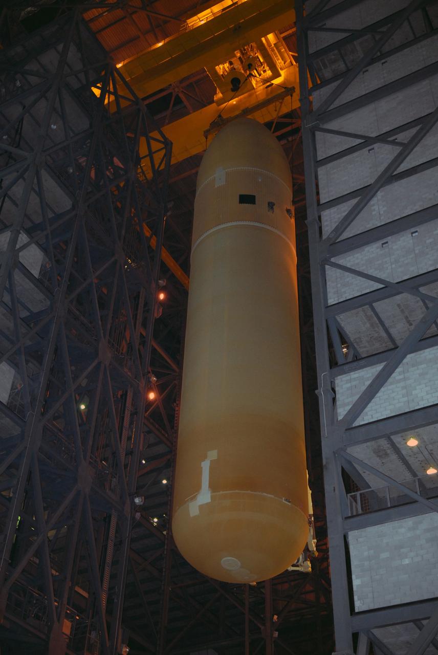 CAPE CANAVERAL, Fla. –   In the Vehicle Assembly Building at NASA's Kennedy Space Center, external fuel tank 129 is lifted out of the checkout cell to high bay 1where it will be mated with the solid rocket boosters. The external tank-SRB stack will be mated in two weeks to space shuttle Endeavour for the STS-126 mission.   The STS-126 mission will deliver a Multi-Purpose Logistics Module to the International Space Station.  Launch is targeted for Nov. 10. Photo credit: NASA/Jack Pfaller