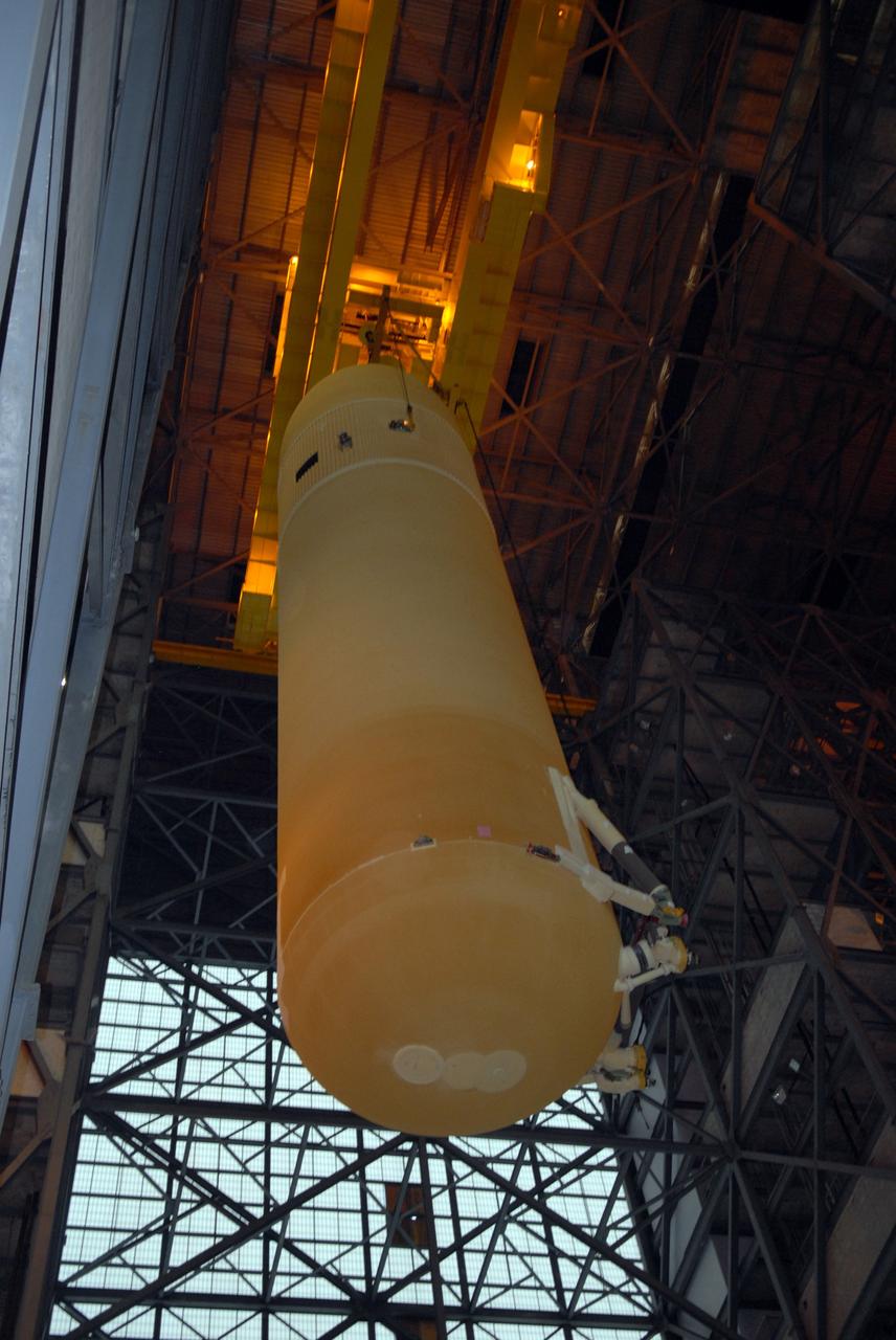 CAPE CANAVERAL, Fla. –   In the Vehicle Assembly Building at NASA's Kennedy Space Center, external fuel tank 129 is lifted out of the checkout cell to high bay 1 where it will be mated with the solid rocket boosters. The external tank-SRB stack will be mated in two weeks to space shuttle Endeavour for the STS-126 mission.   The STS-126 mission will deliver a Multi-Purpose Logistics Module to the International Space Station.  Launch is targeted for Nov. 10. Photo credit: NASA/Jack Pfaller