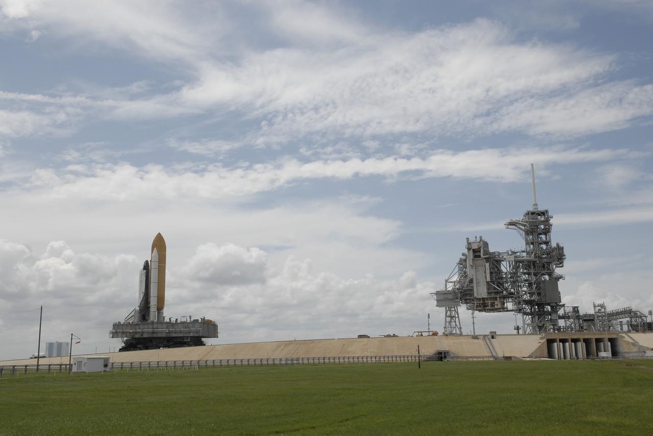 CAPE CANAVERAL, Fla. –  Space shuttle Atlantis makes the slow journey up the incline to the top of Launch Pad 39A at NASA's Kennedy Space Center. First motion occurred at 9:19 a.m. EDT and Atlantis was hard down on the pad at 3:52 p.m.. The shuttle stack, with solid rocket boosters and external fuel tank attached to Atlantis, rest on the mobile launcher platform.  Movement is provided by the crawler-transporter underneath.  The Sept. 2 rollout date was postponed due to Tropical Storm Hanna’s shift to a northern track. Atlantis is scheduled to launch on the STS-125 mission to service NASA’s Hubble Space Telescope.  Launch is targeted for Oct. 8.  Photo credit: NASA/Kim Shiflett